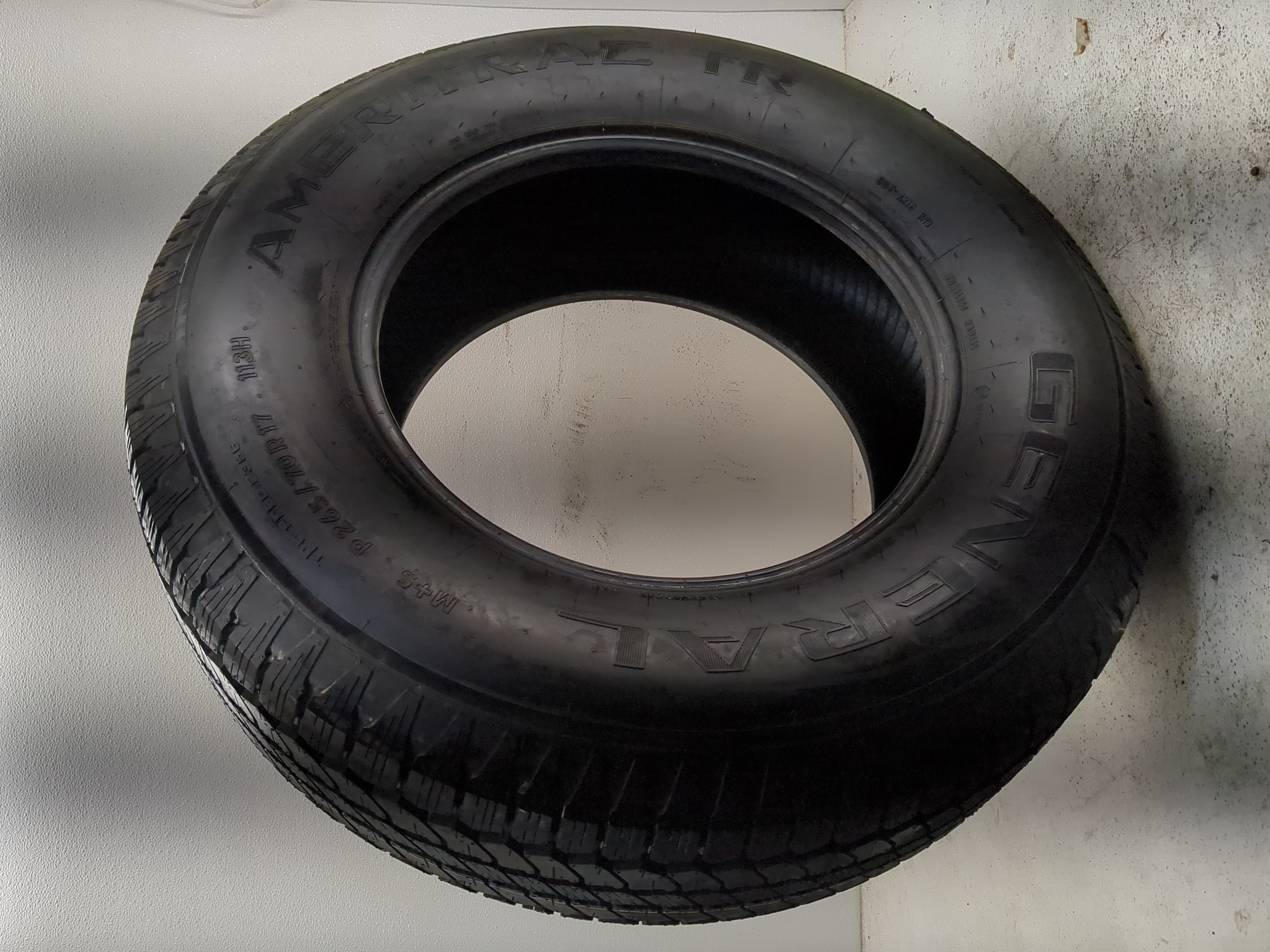 Used Tire P265/70R17 GENERAL AMERITRAC 113H - Tread Depth 15/32 - Oemusedautoparts1.com