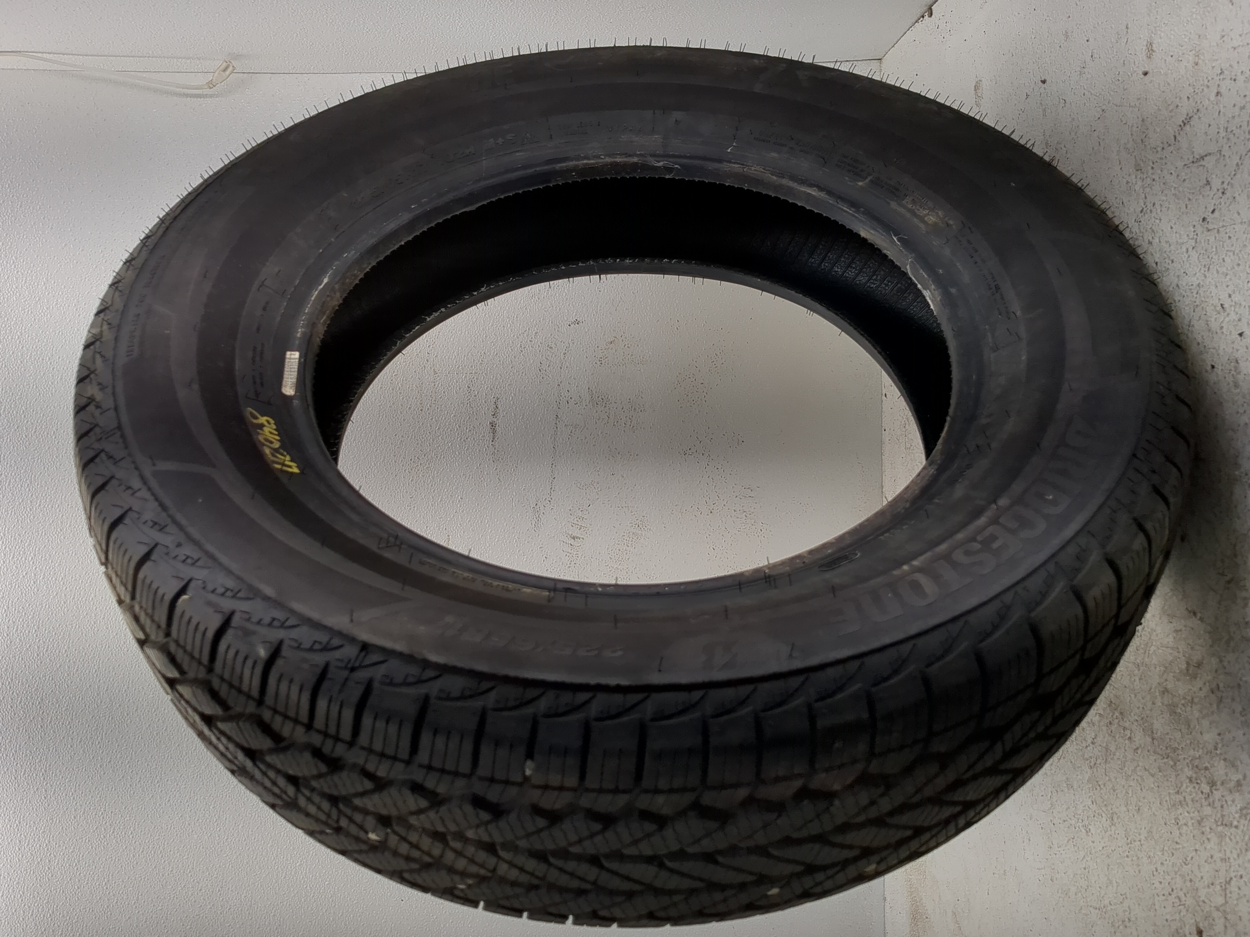 Used Tire 225/65R17 BRIDGESTONE WEATHERPEAK 102H - Tread Depth 10/32 - Oemusedautoparts1.com