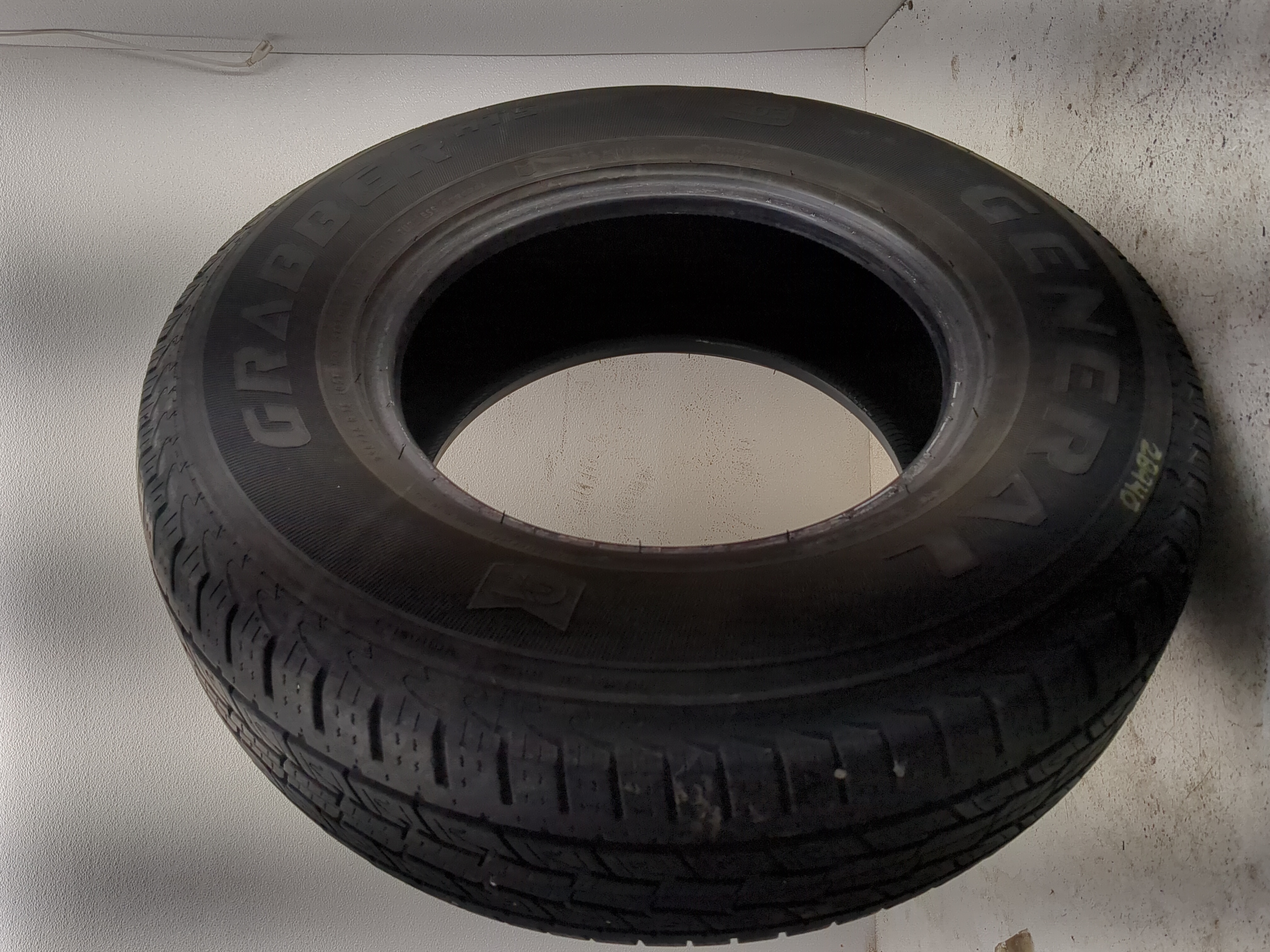 Used Tire 205/75R15 GENERAL GRABBER HTS 105T - Tread Depth 8.5/32 - Oemusedautoparts1.com