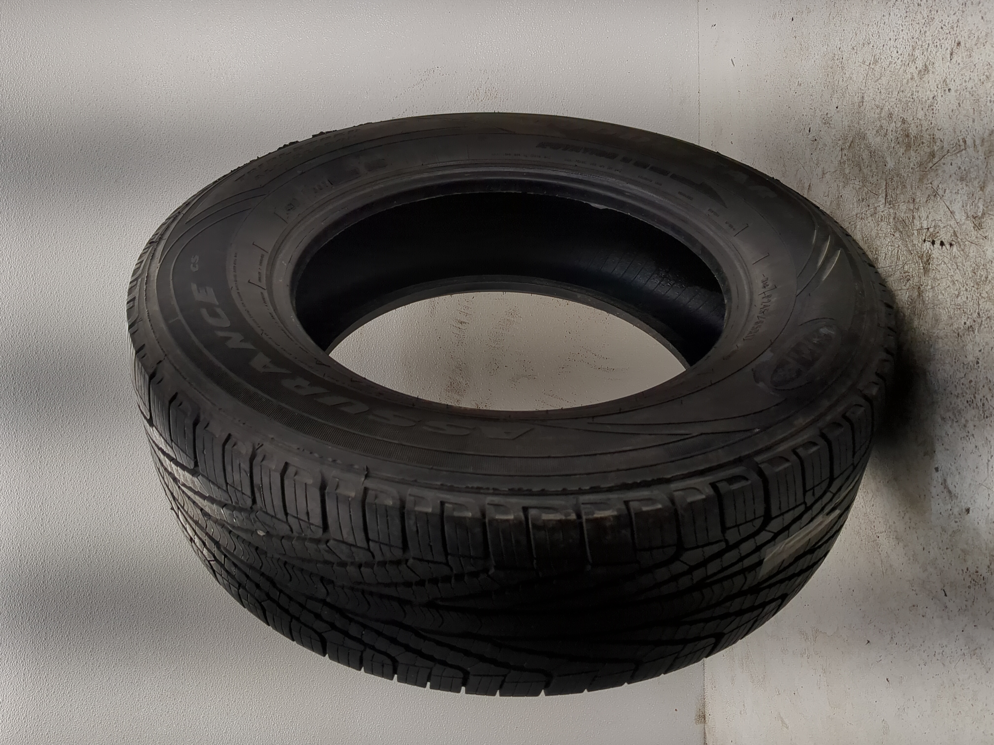 Used Tire P245/65R17 GOODYEAR ASSURANCE CS 105T - Tread Depth 9/32 - Oemusedautoparts1.com