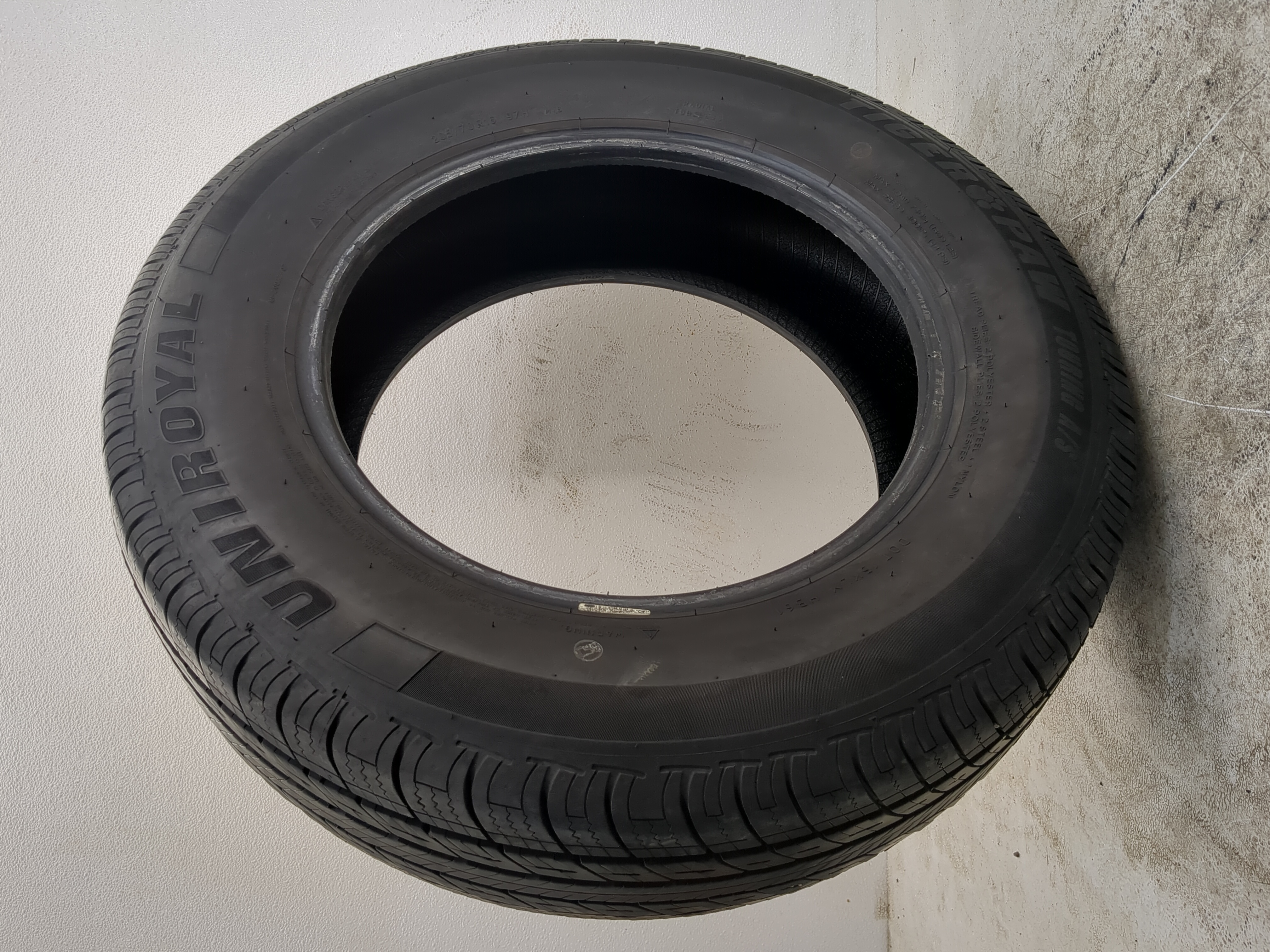 Used Tire 205/70R16 UNIROYAL TIGER PAW TOURING A/S 97H - Tread Depth 9.5/32 - Oemusedautoparts1.com