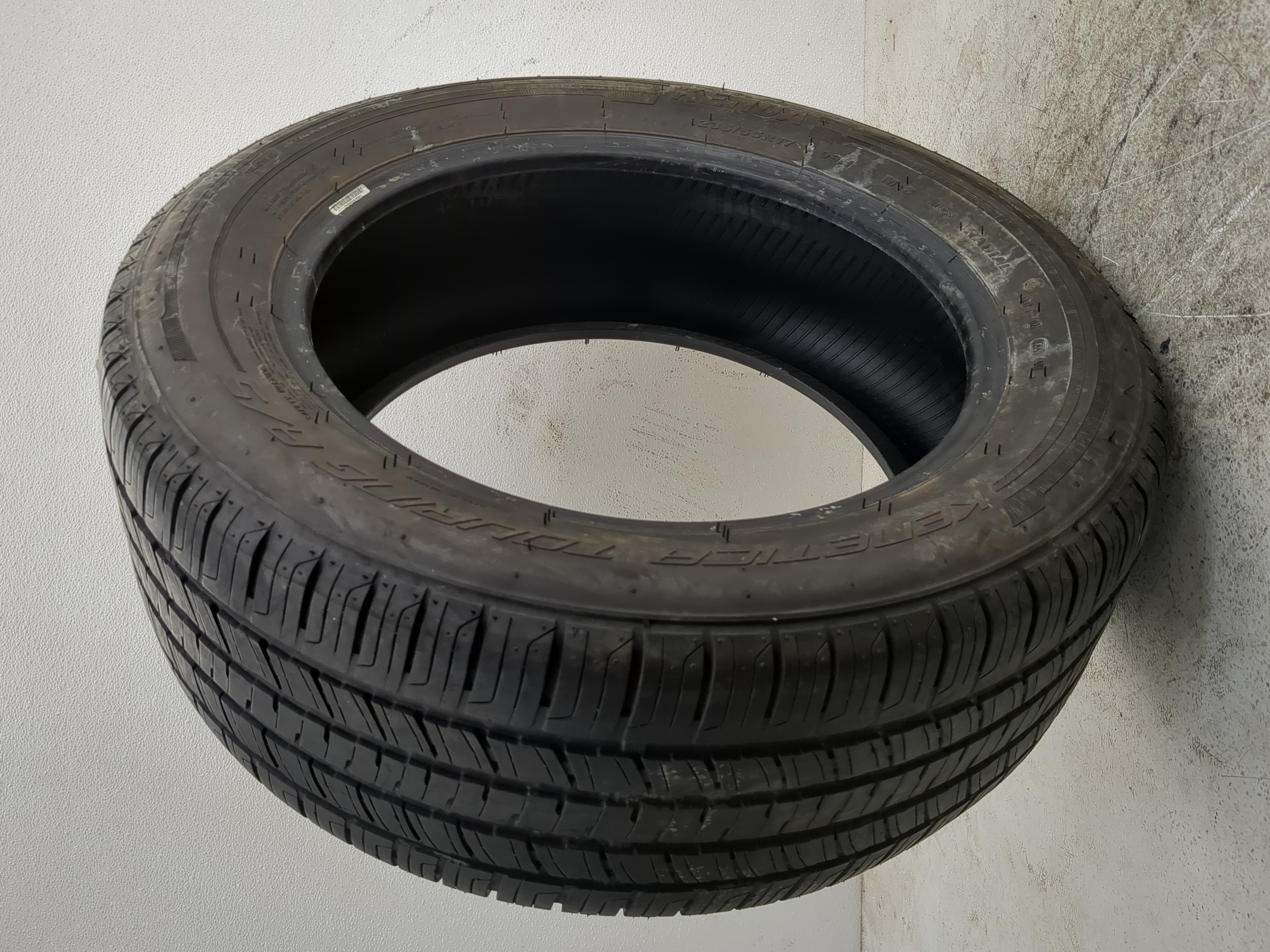 Used Tire 235/55R17 KENDA KENETICA TOURING A/S 99H - Tread Depth 6/32 - Oemusedautoparts1.com