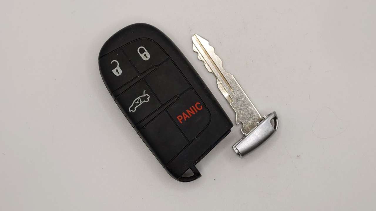 Chrysler 300 Keyless Entry Remote Fob M3N-XXXXXXXX 68155687AA 4 buttons 262017 - Oemusedautoparts1.com
