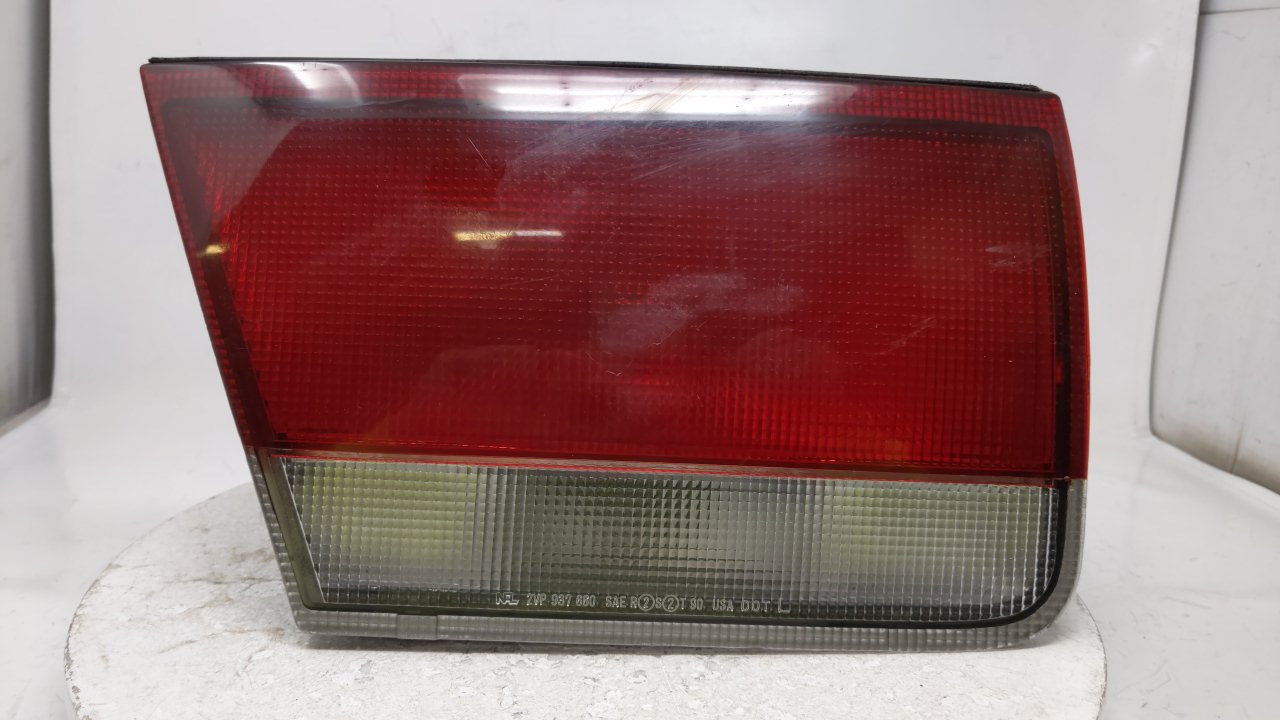Picture of 1993-1997 Mazda 626 Driver Left Side Tail Light Taillight Oem 37526