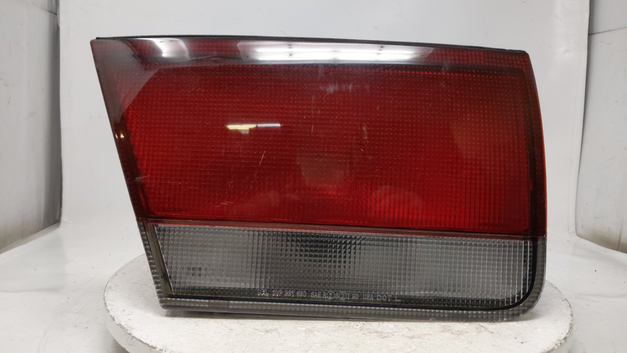 Picture of 1993-1997 Mazda 626 Driver Left Side Tail Light Taillight Oem 38560