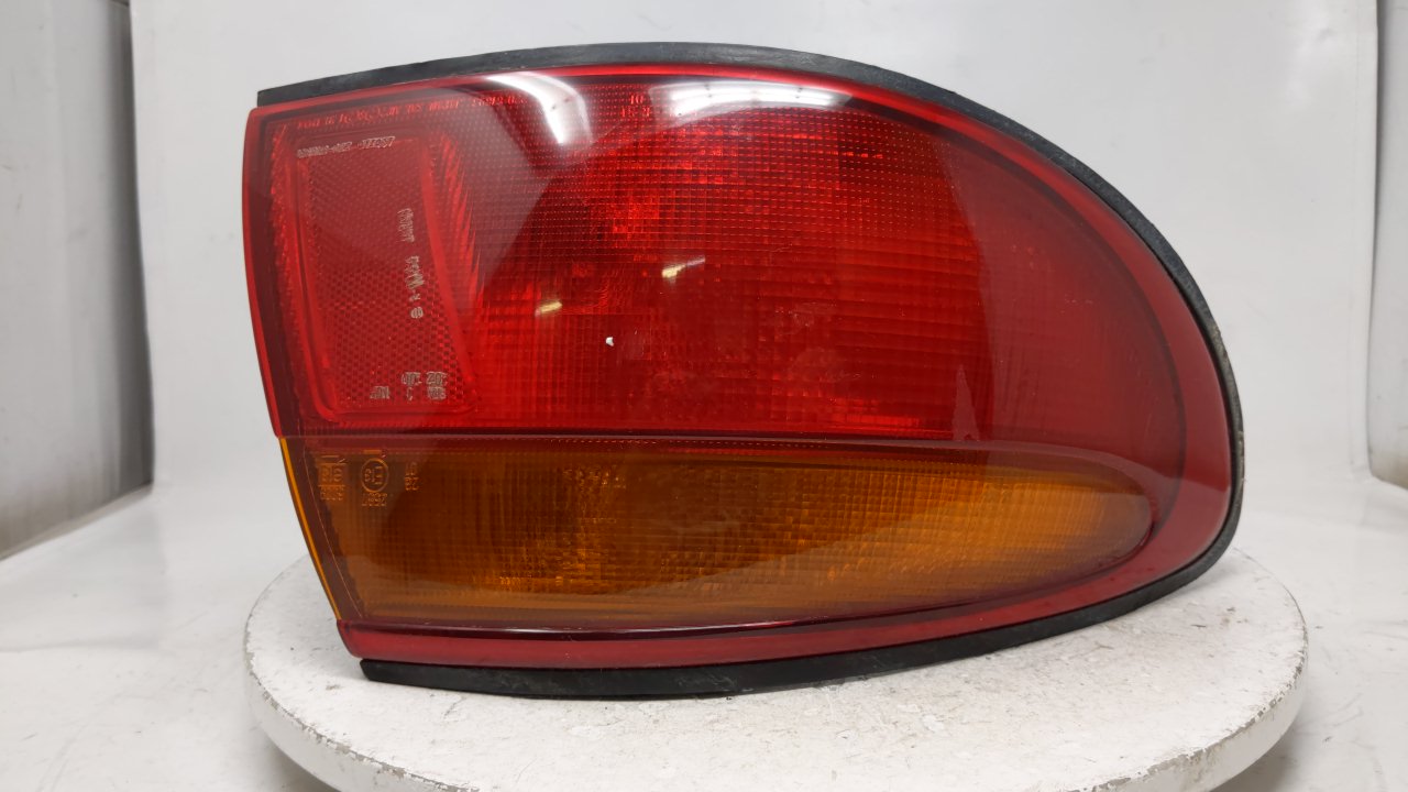 Picture of 1996-1998 Mazda Millenia Driver Side Tail Light Taillight OEM  39644