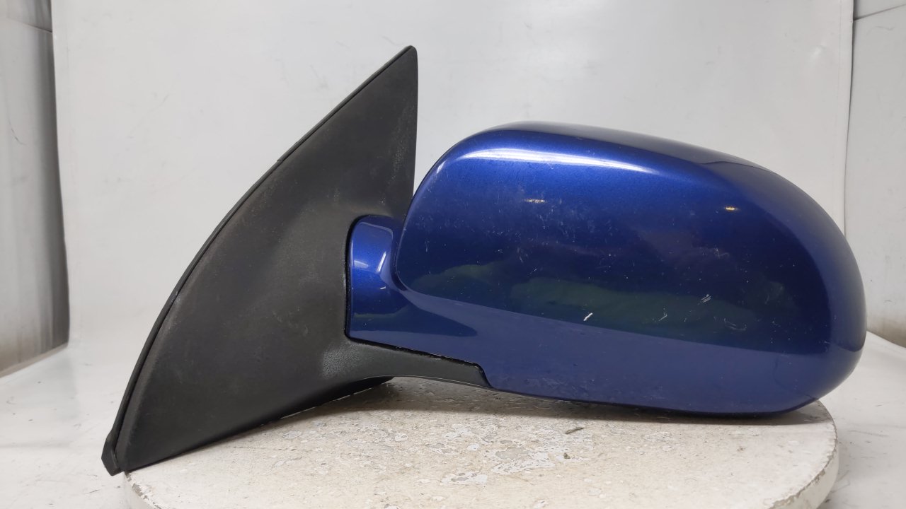 2004-2008 Suzuki Forenza Driver Left Side View Power Door Mirror Blue 45397 - Oemusedautoparts1.com