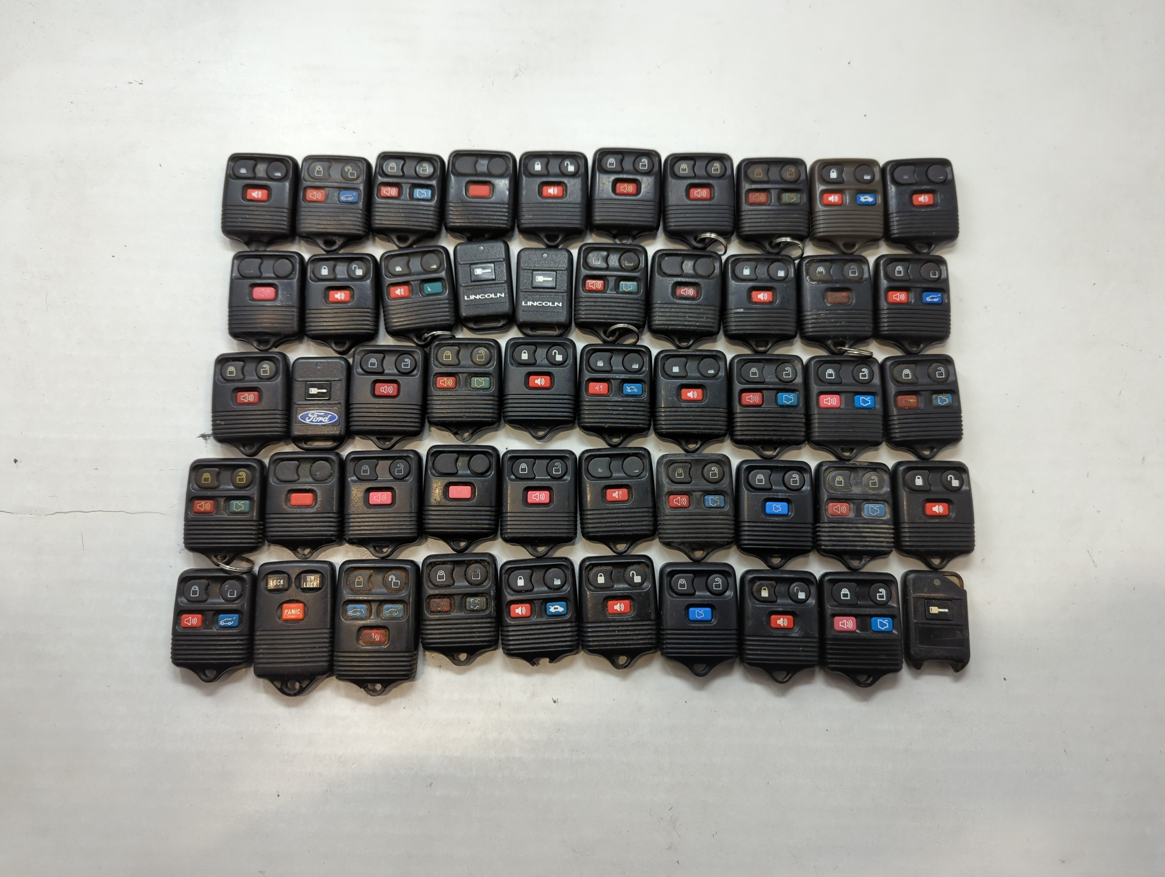 Lot of 50 Ford Keyless Entry Remote Fob MIXED FCC IDS MIXED PART NUMBERS 533943 - Oemusedautoparts1.com