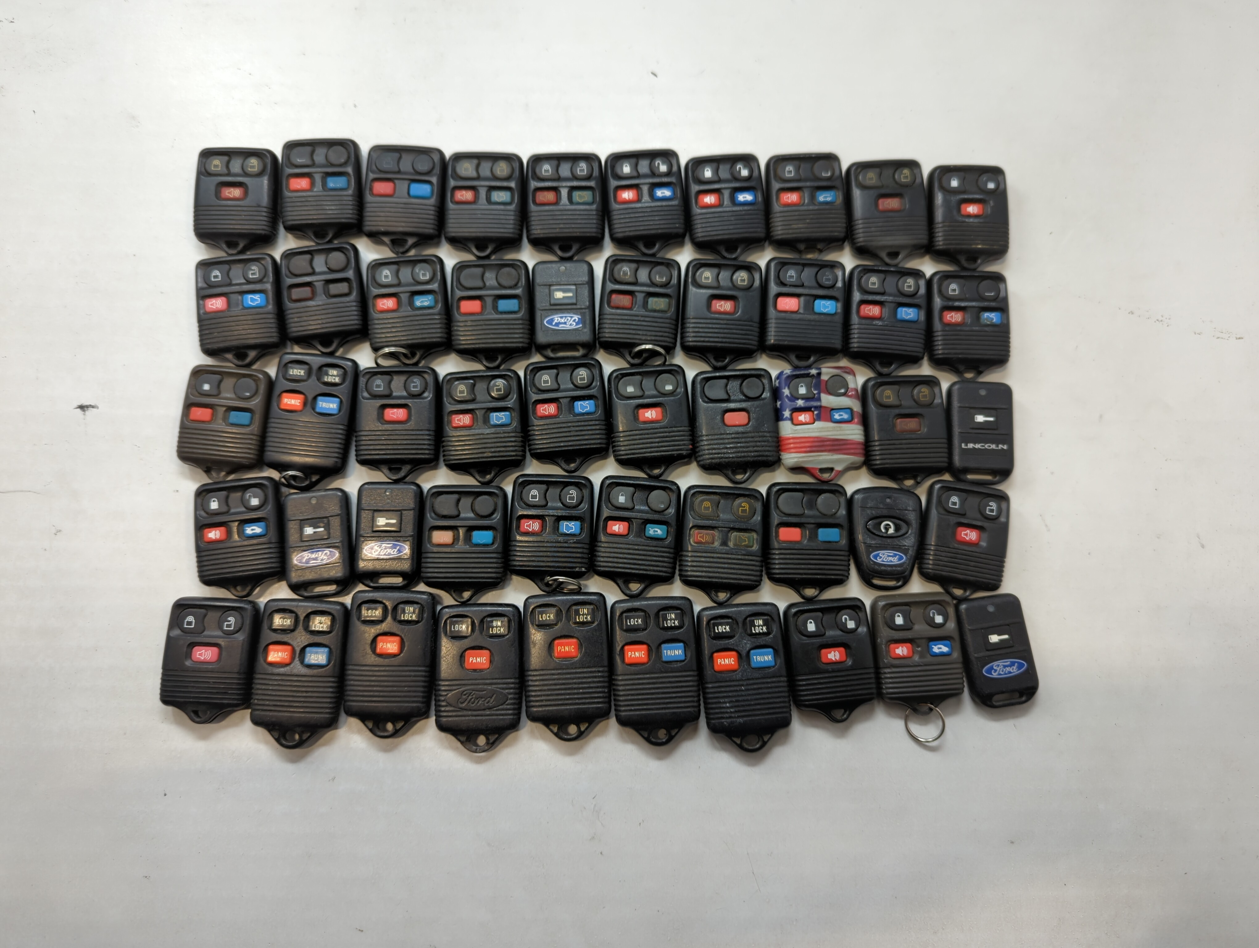 Lot of 50 Ford Keyless Entry Remote Fob MIXED FCC IDS MIXED PART NUMBERS 533944 - Oemusedautoparts1.com