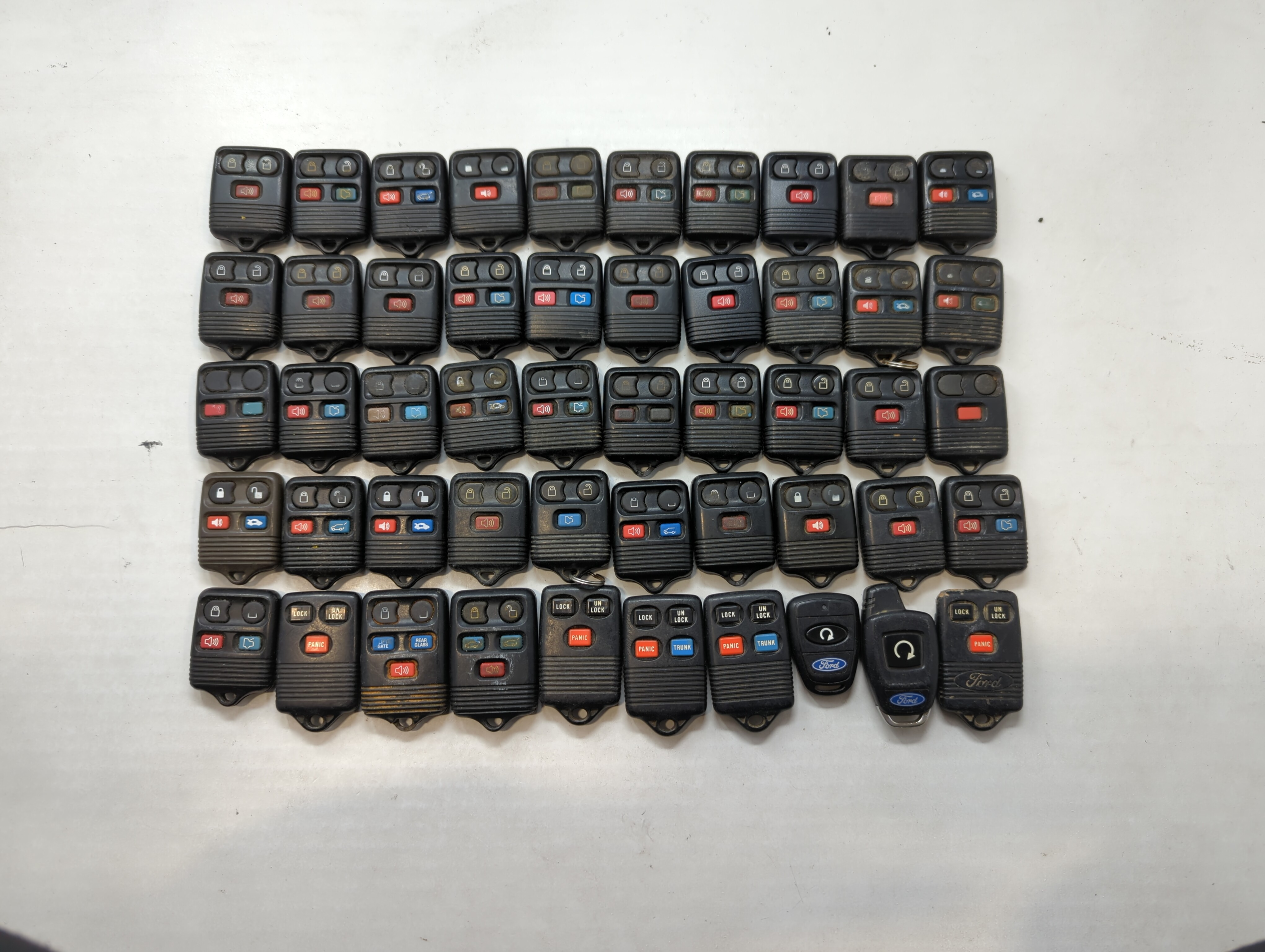 Lot of 50 Ford Keyless Entry Remote Fob MIXED FCC IDS MIXED PART NUMBERS 533946 - Oemusedautoparts1.com