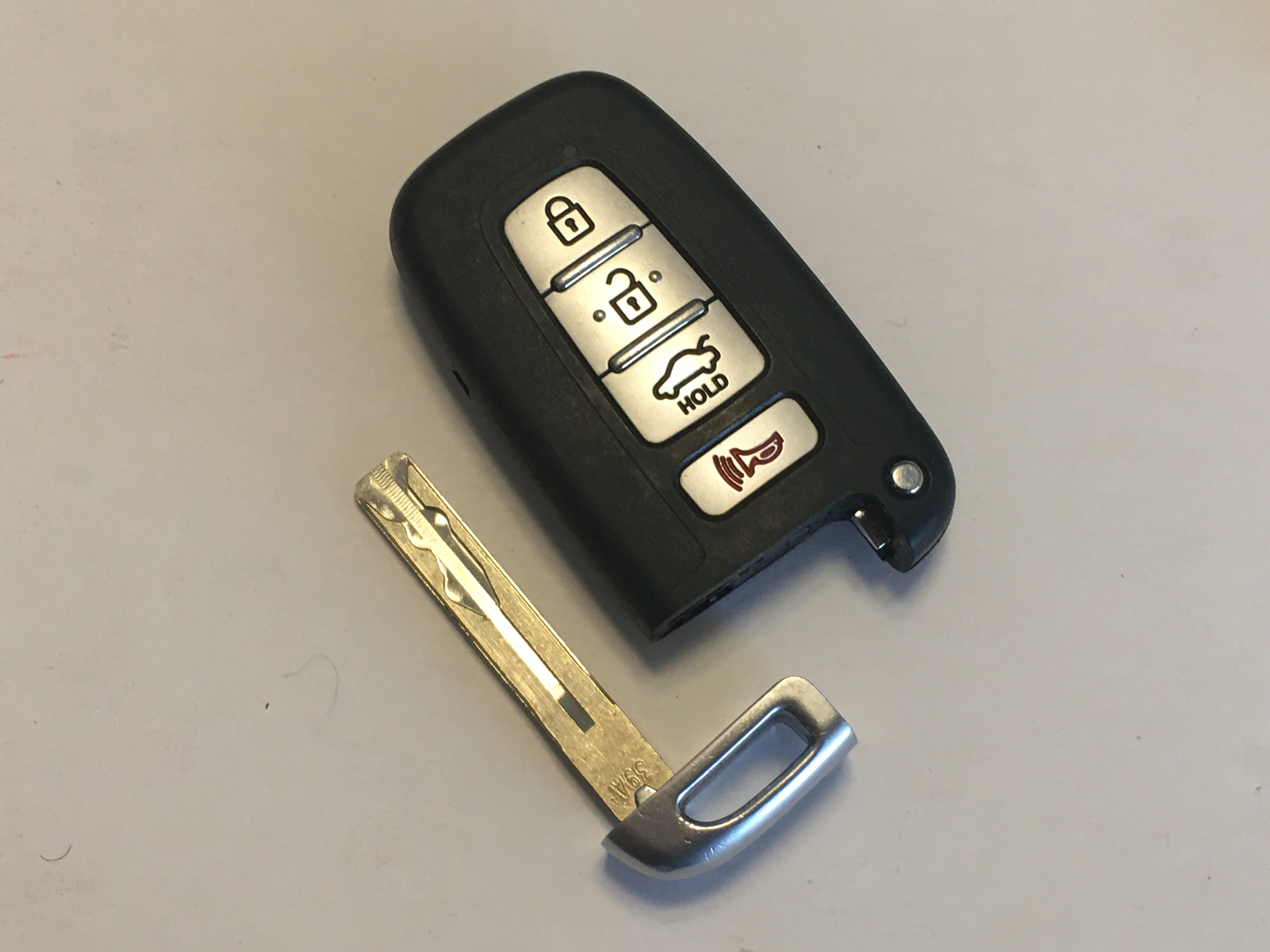 Picture of Kia Rio Keyless Entry Remote Fob SY5HMFNA04 SVI-HMFNA04 4 buttons 55460