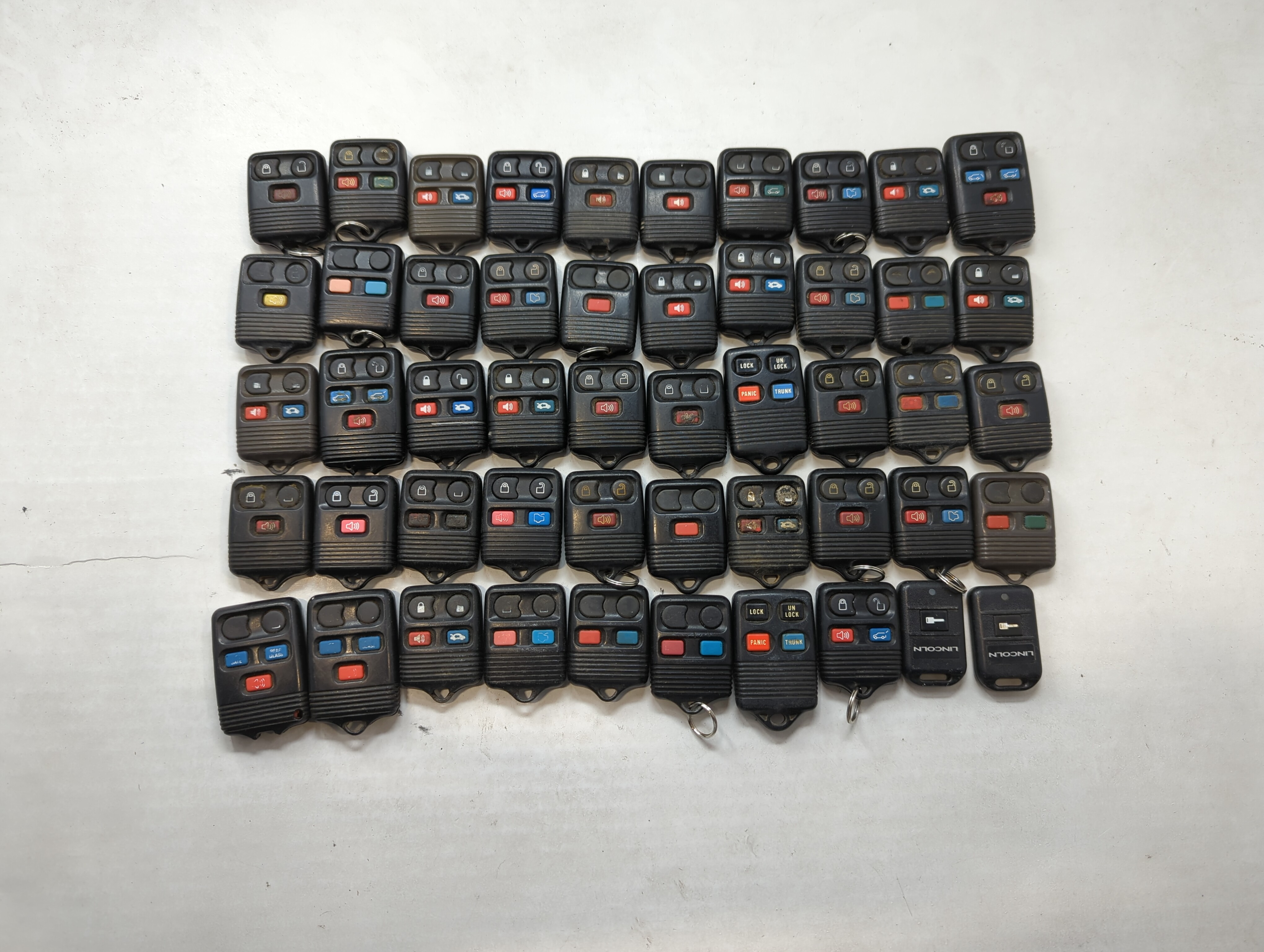 Picture of Lot of 50 Ford Keyless Entry Remote Fob MIXED FCC IDS MIXED PART NUMBERS 557859