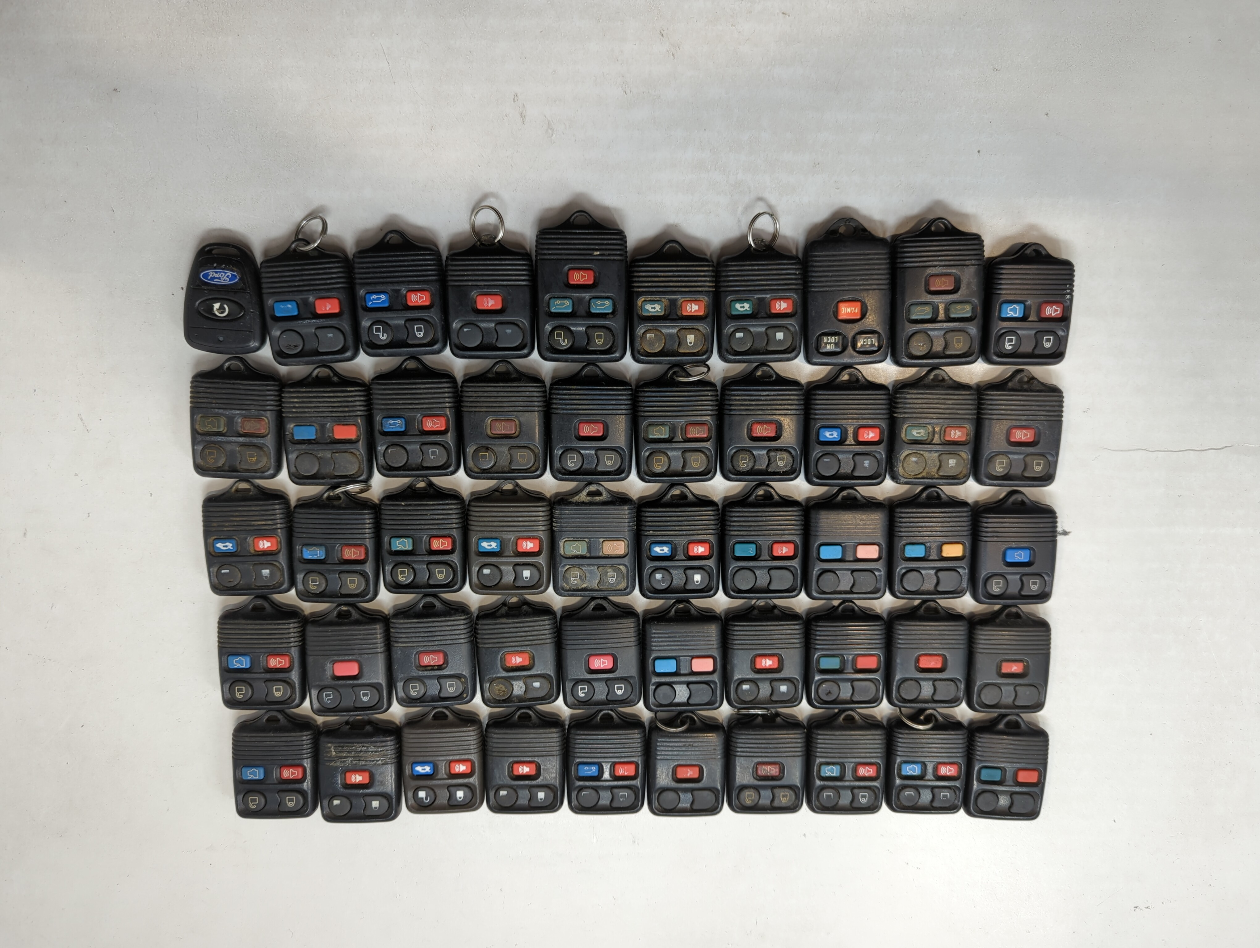Picture of Lot of 50 Ford Keyless Entry Remote Fob MIXED FCC IDS MIXED PART NUMBERS 557863