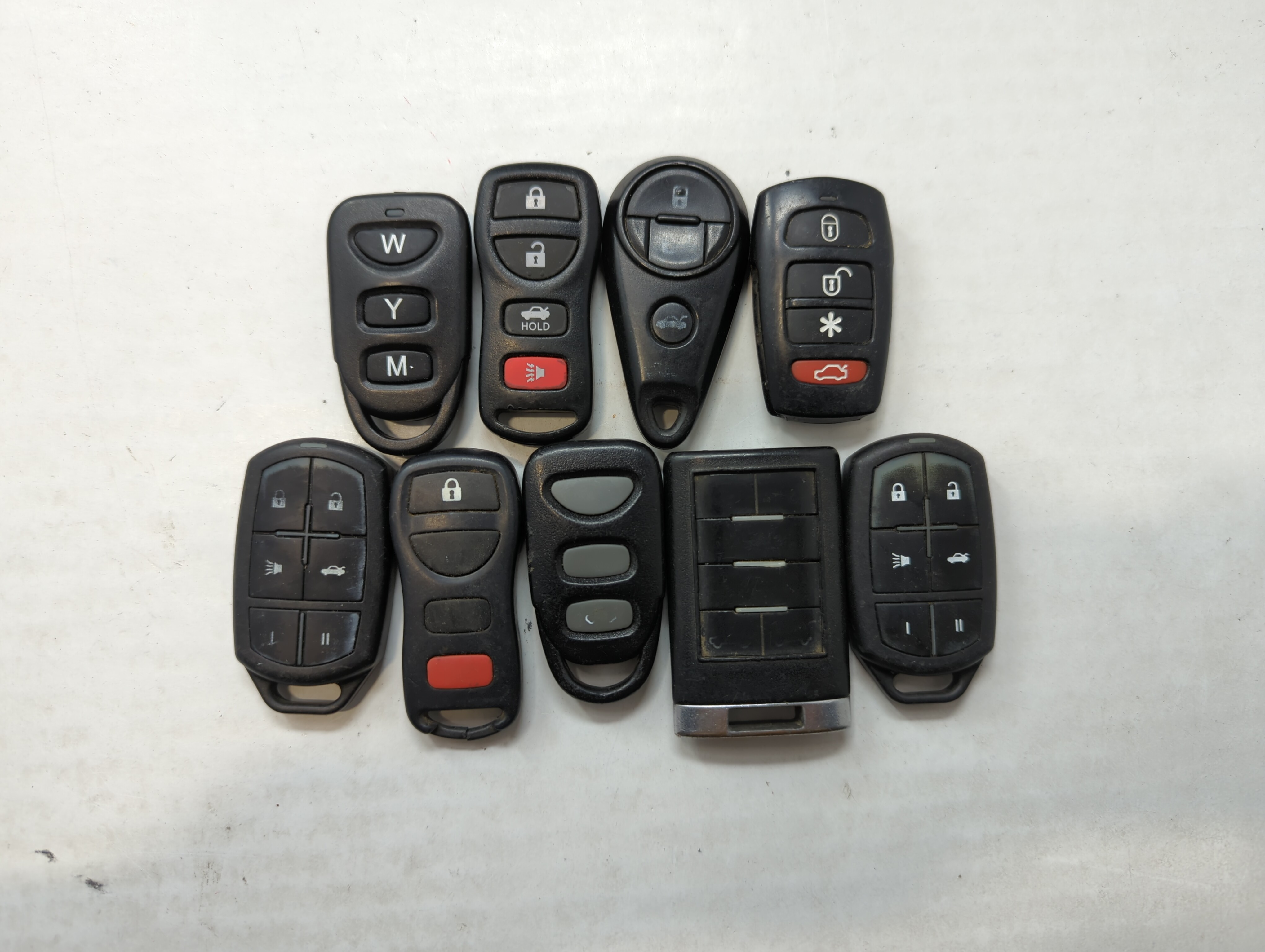 Picture of Lot of 10 Aftermarket Keyless Entry Remote Fob MIXED FCC IDS MIXED PART 558758