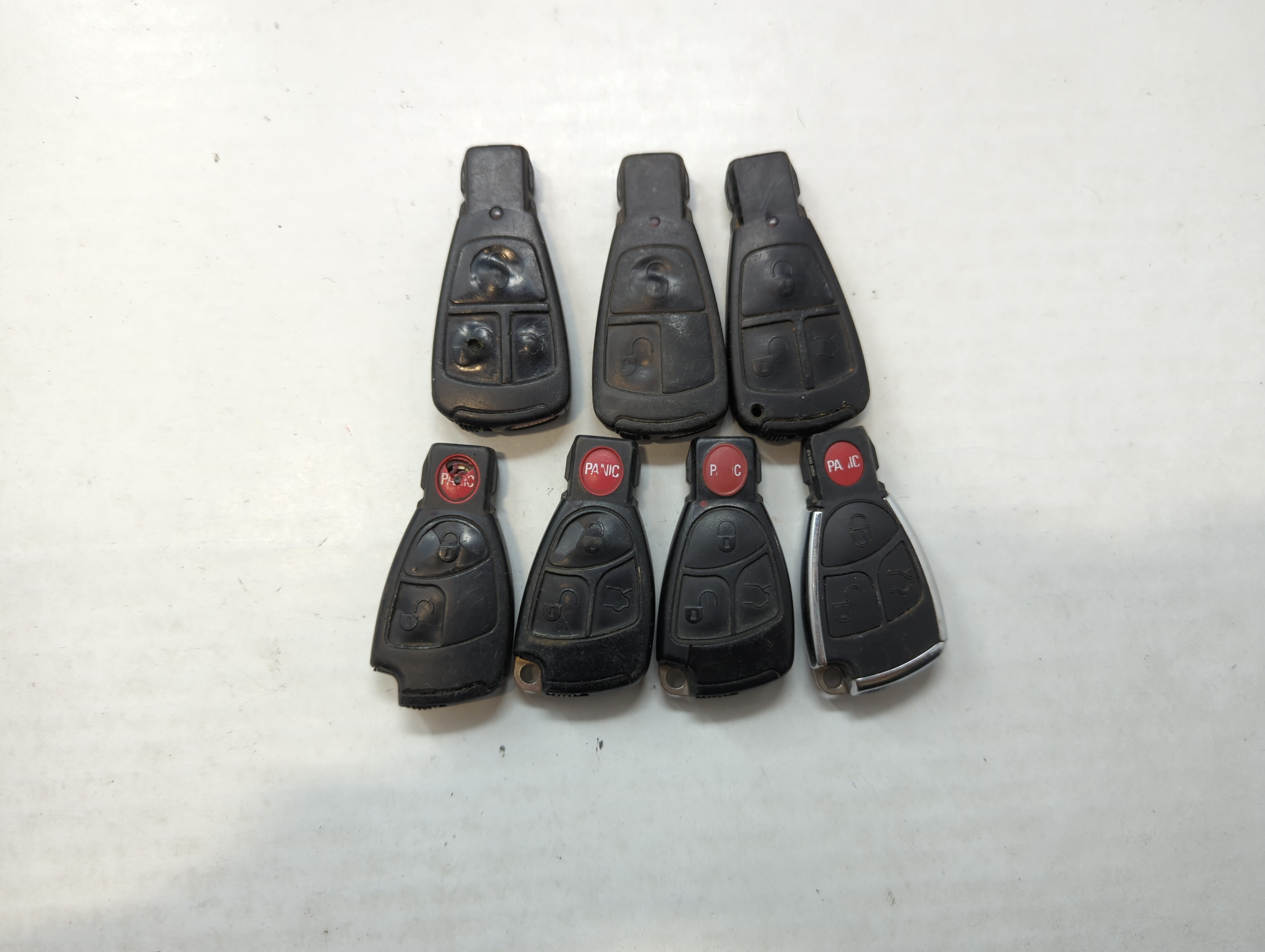 Lot of 7 Mercedes-Benz Keyless Entry Remote Fob MIXED FCC IDS MIXED PART 558953 - Oemusedautoparts1.com
