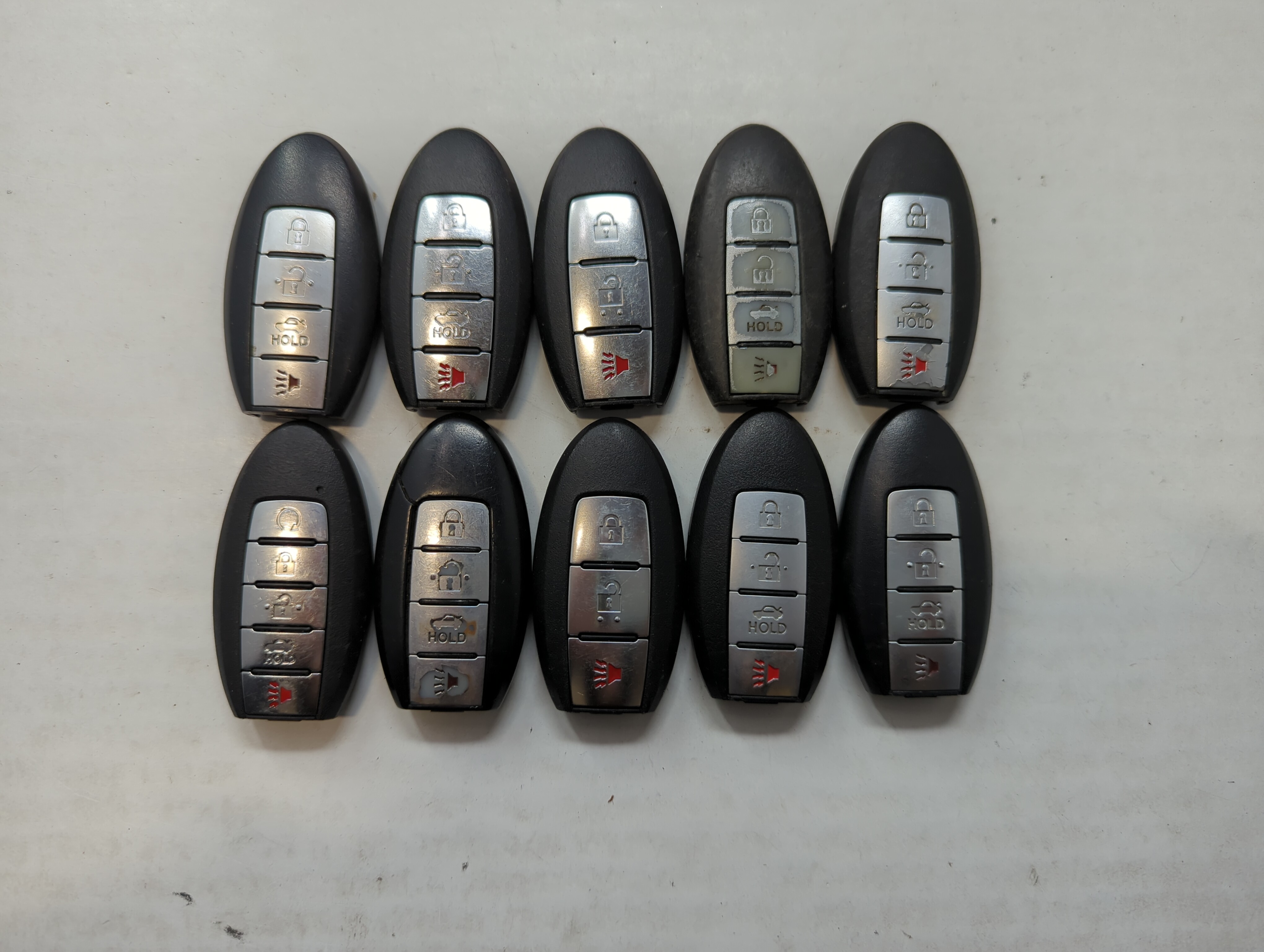 Picture of Lot of 10 Aftermarket Nissan Keyless Entry Remote Fob MIXED FCC IDS 559528