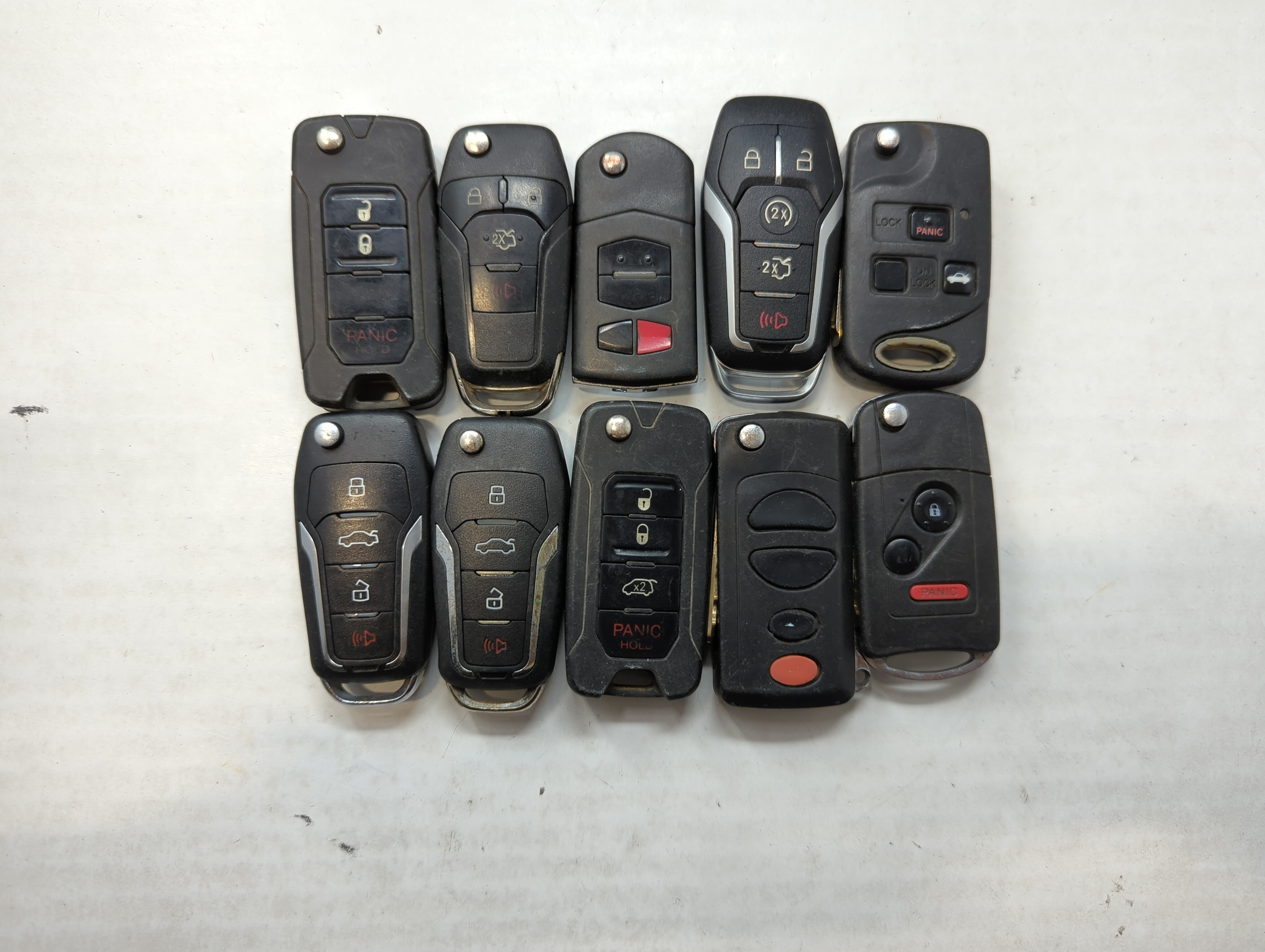 Picture of Lot of 10 Aftermarket Keyless Entry Remote Fob MIXED FCC IDS MIXED PART 559660