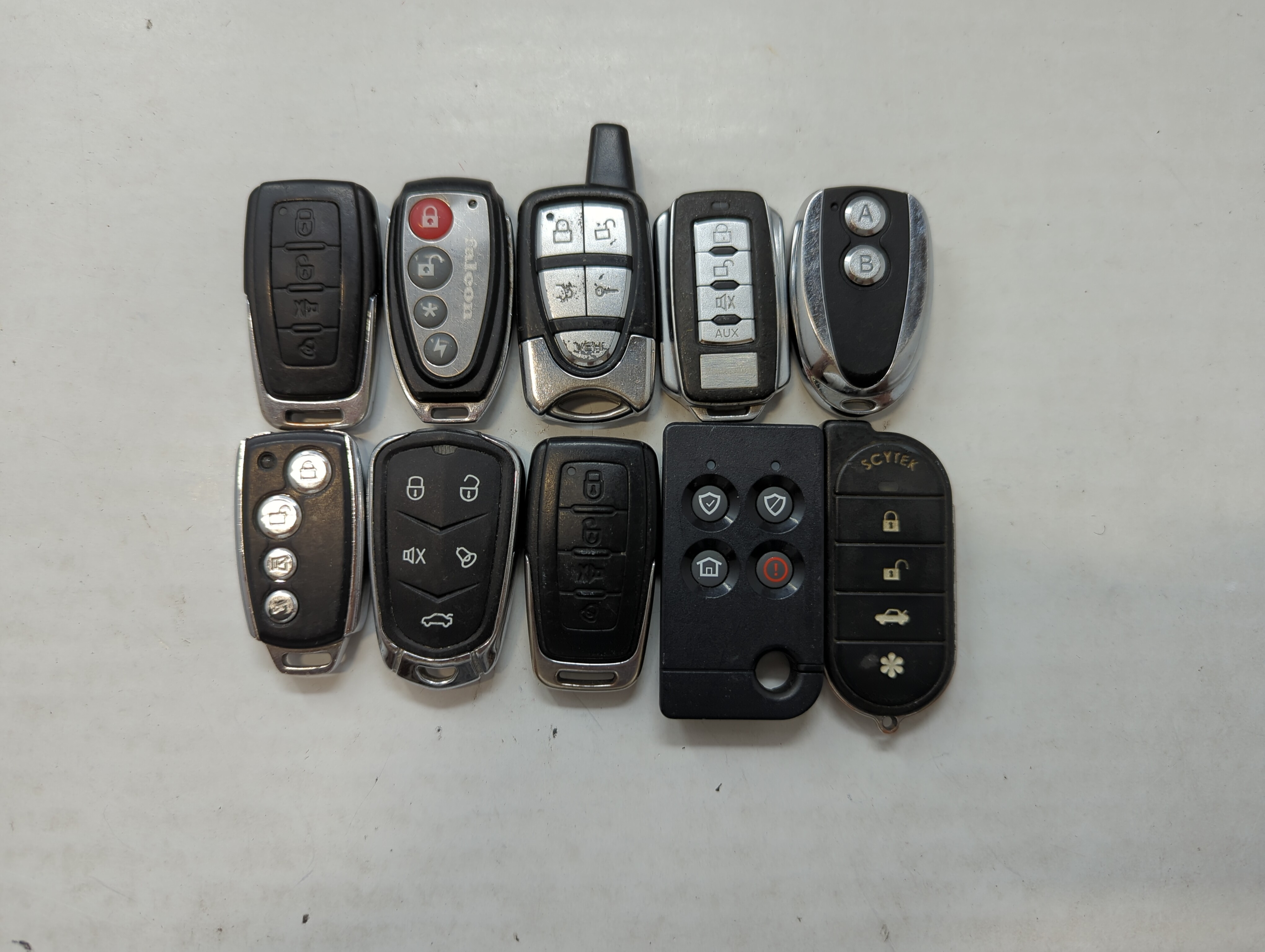 Picture of Lot of 10 Aftermarket Keyless Entry Remote Fob MIXED FCC IDS MIXED PART 559844