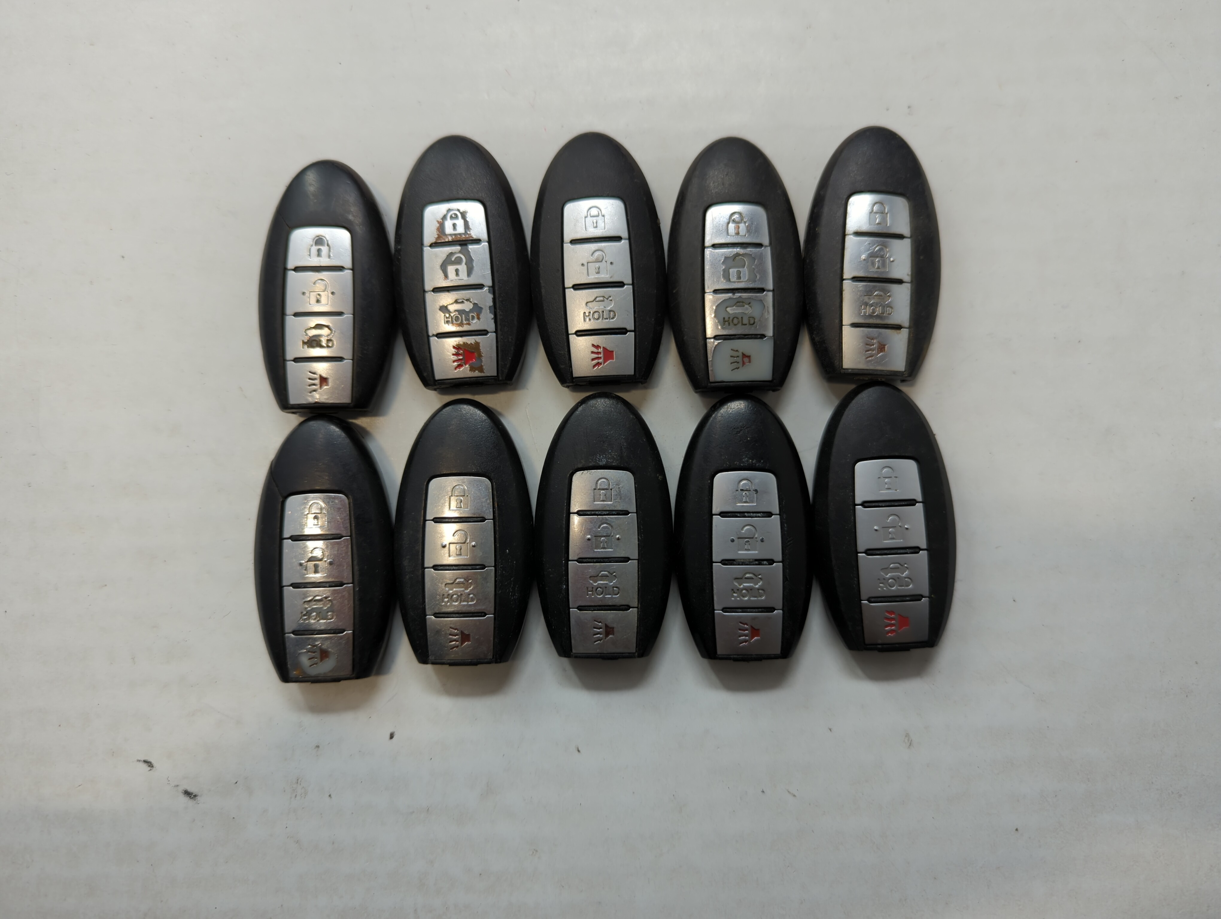 Picture of Lot of 10 Aftermarket Nissan Keyless Entry Remote Fob MIXED FCC IDS 563239