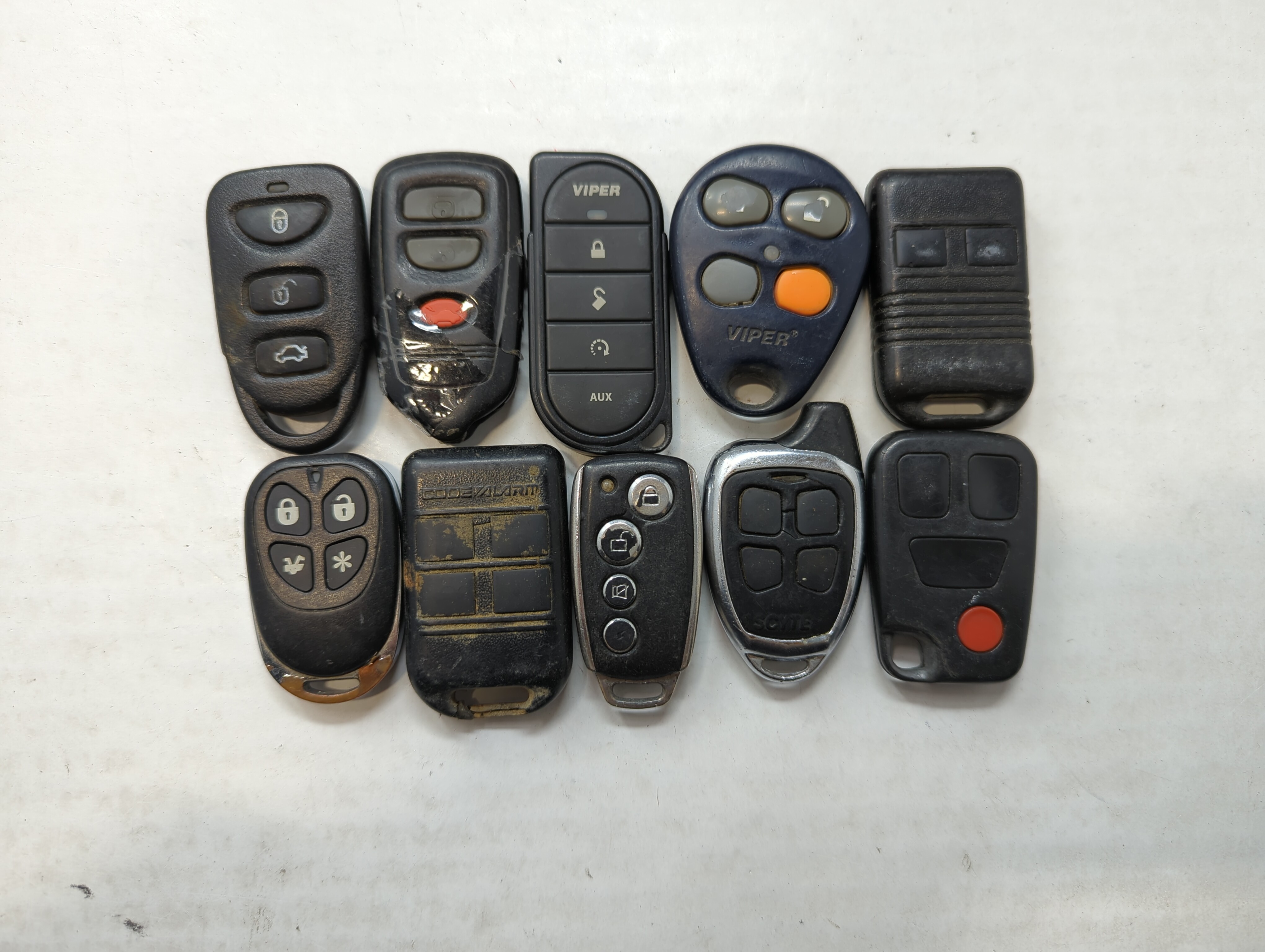 Picture of Lot of 10 Aftermarket Keyless Entry Remote Fob MIXED FCC IDS MIXED PART 563563