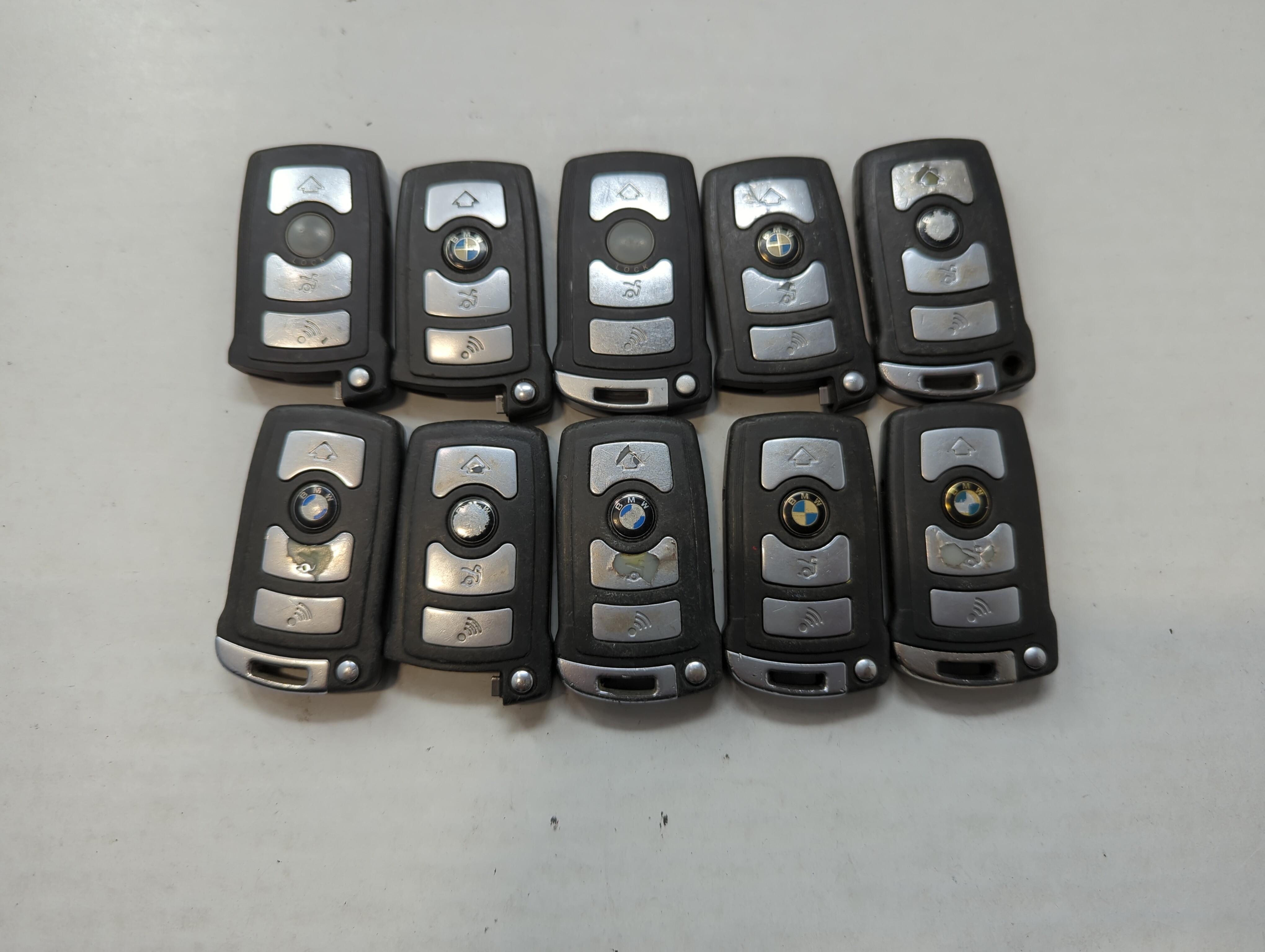 Picture of Lot of 10 Bmw Keyless Entry Remote Fob MIXED FCC IDS MIXED PART NUMBERS 563652