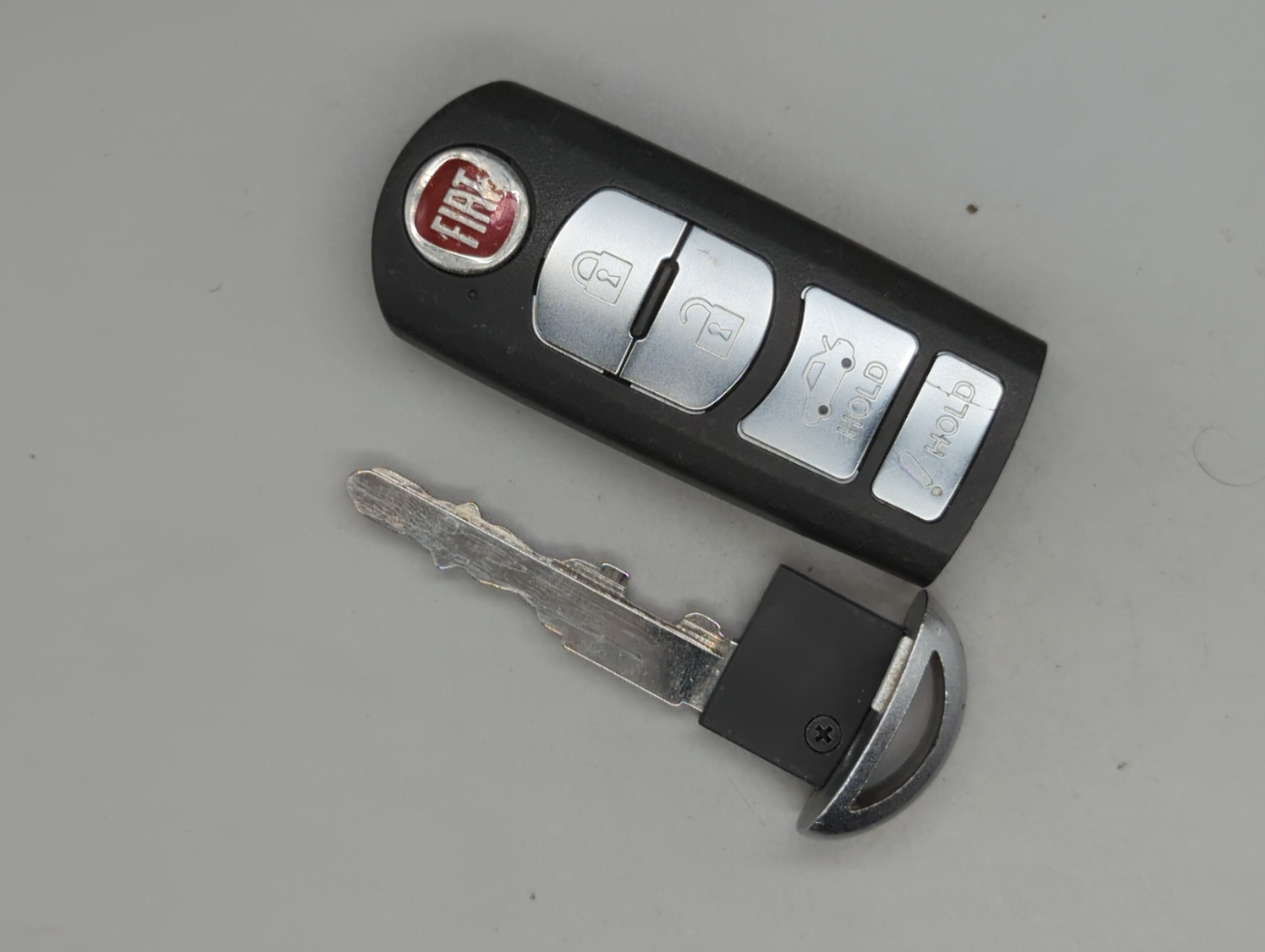 Fiat Keyless Entry Remote Fob WAZSKE13D01 COFETEL: RLVMISK11-0705 4 buttons - Oemusedautoparts1.com