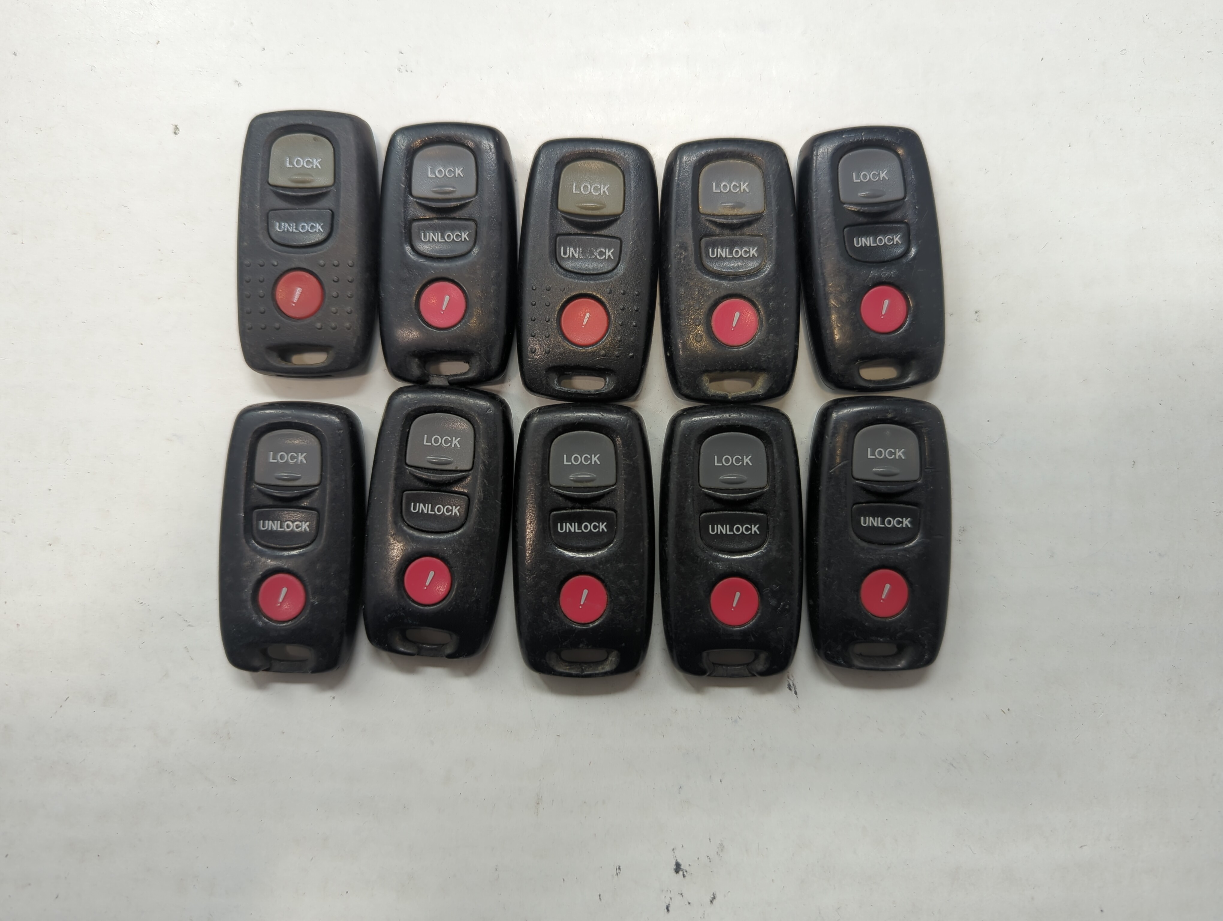 Lot of 10 Mazda Keyless Entry Remote Fob MIXED FCC IDS MIXED PART NUMBERS 591734 - Oemusedautoparts1.com