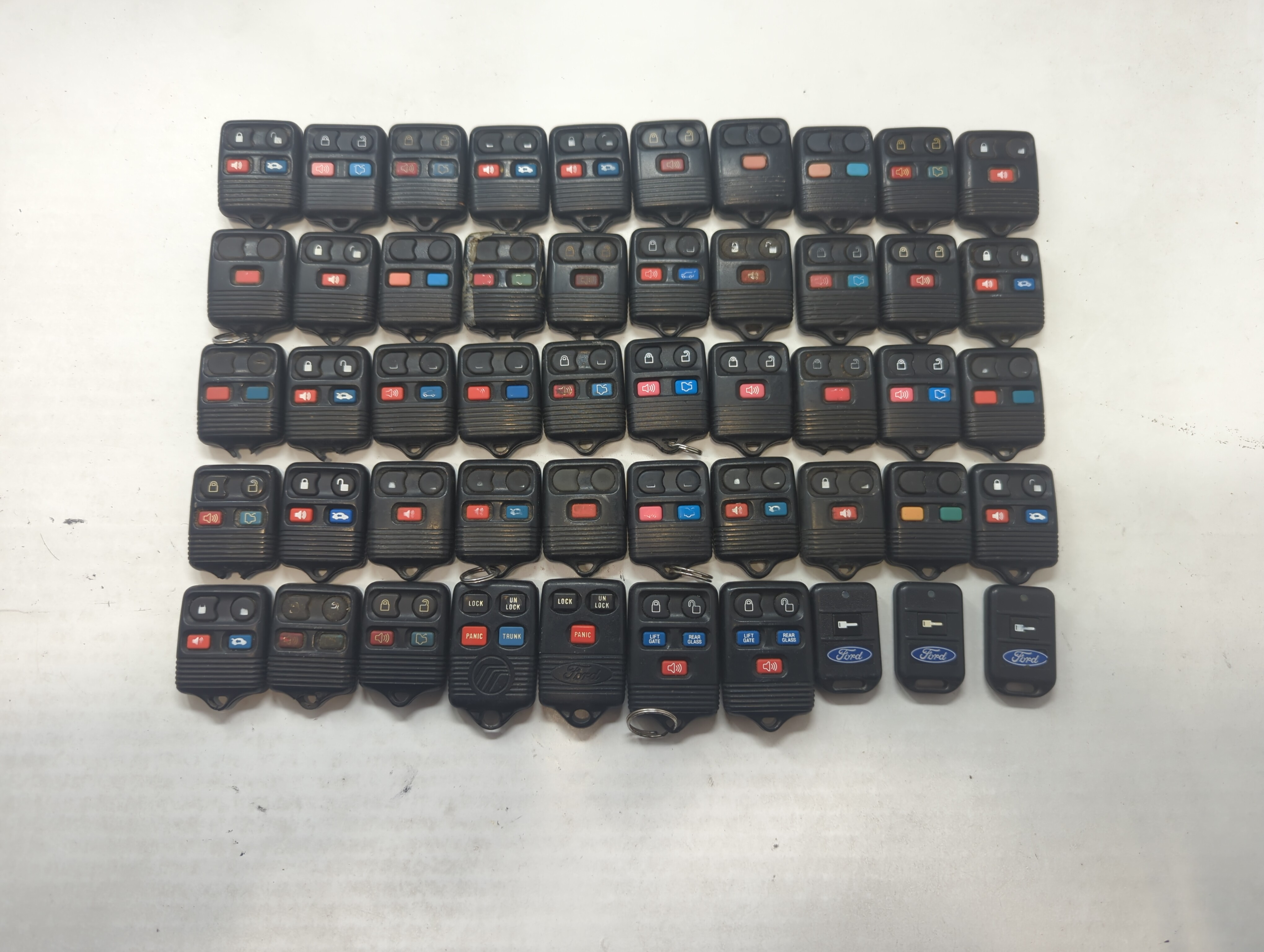 Lot of 50 Ford Keyless Entry Remote Fob MIXED FCC IDS MIXED PART NUMBERS 591948 - Oemusedautoparts1.com