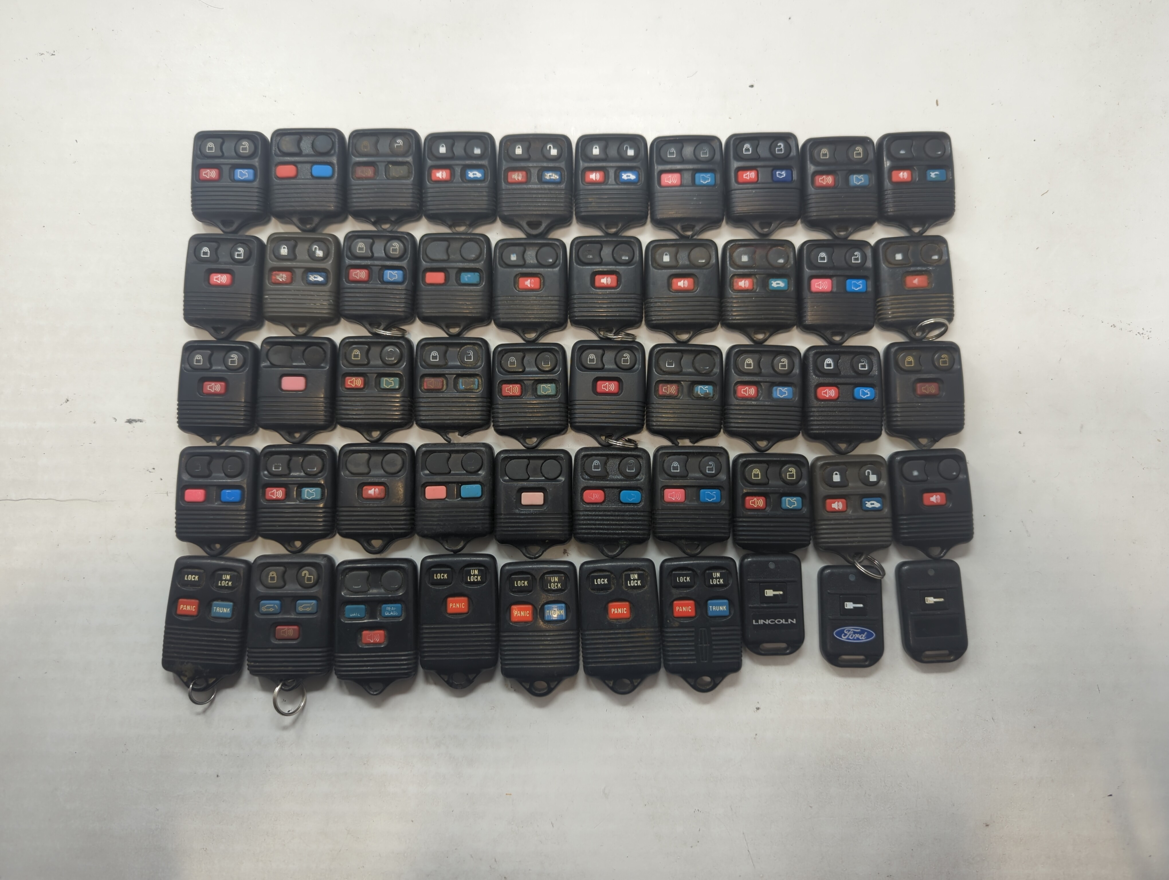 Lot of 50 Ford Keyless Entry Remote Fob MIXED FCC IDS MIXED PART NUMBERS 591950 - Oemusedautoparts1.com