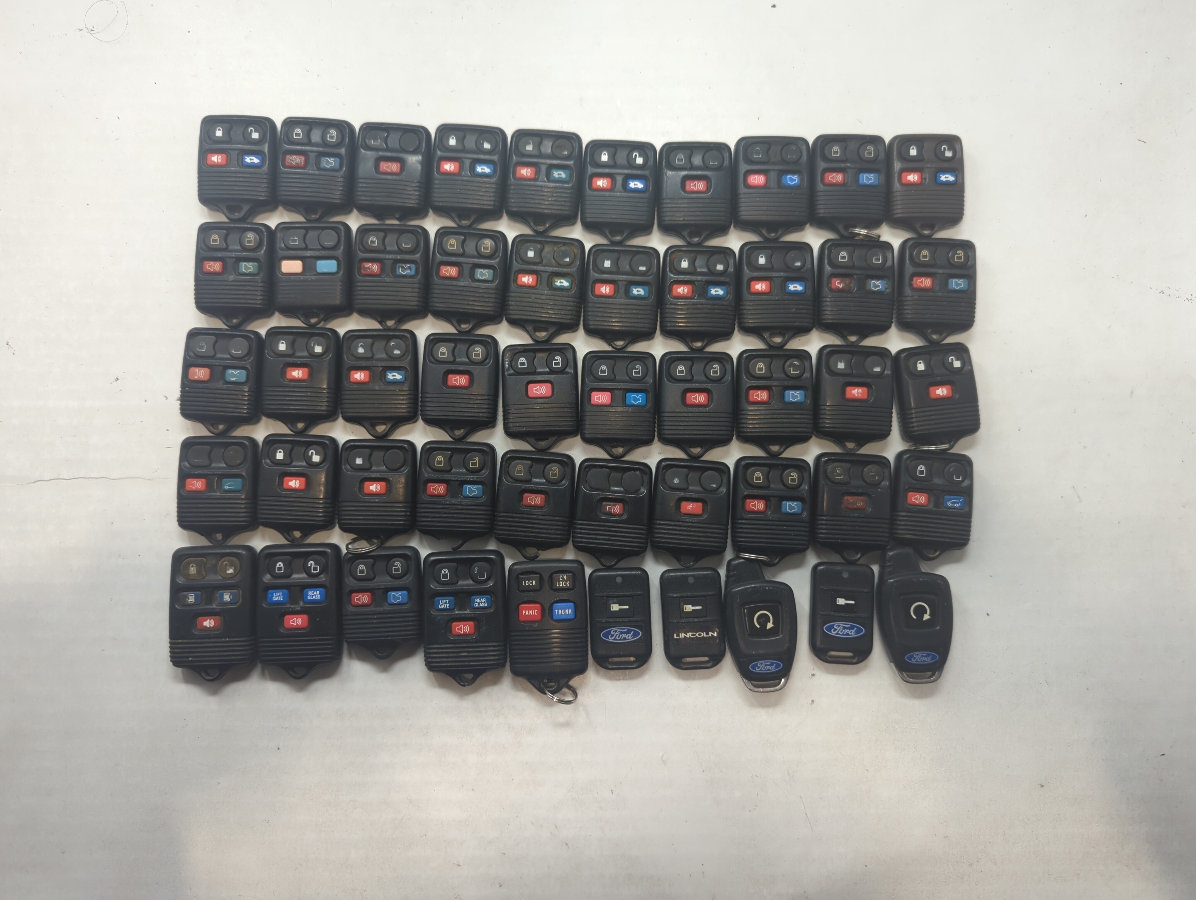 Lot of 50 Ford Keyless Entry Remote Fob MIXED FCC IDS MIXED PART NUMBERS 592020 - Oemusedautoparts1.com