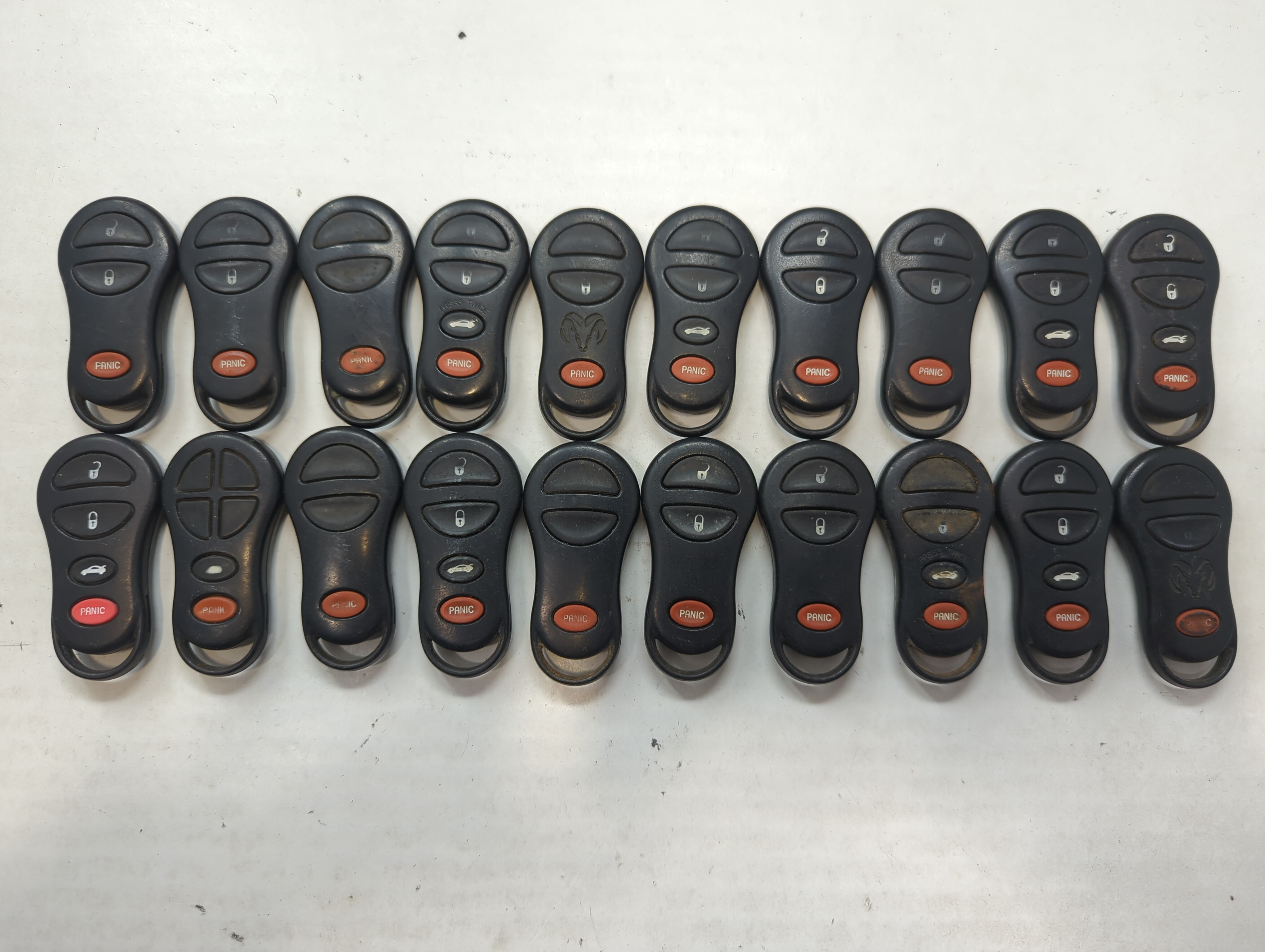 Lot of 20 Dodge Keyless Entry Remote Fob MIXED FCC IDS MIXED PART NUMBERS 592117 - Oemusedautoparts1.com