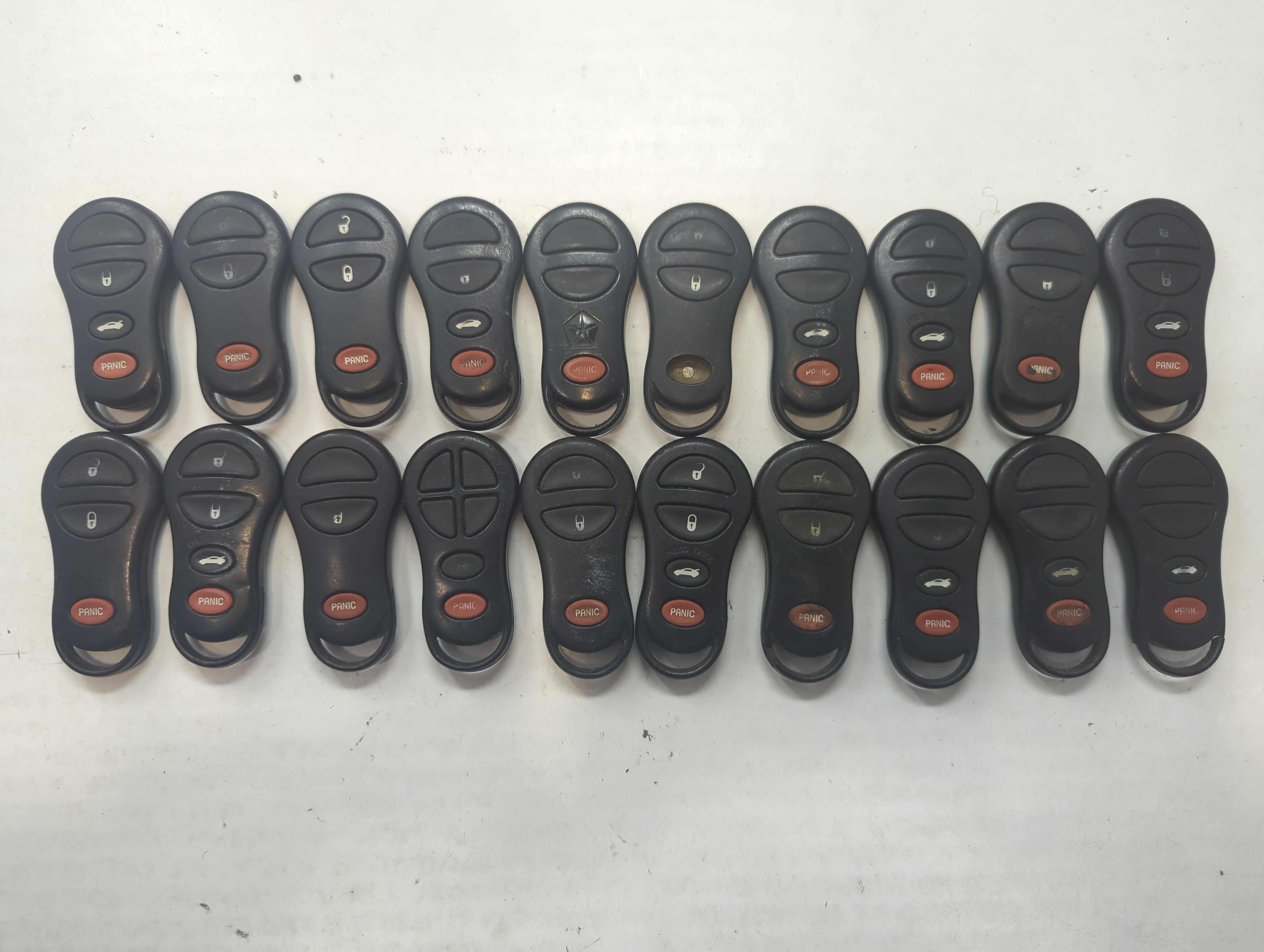 Lot of 20 Dodge Keyless Entry Remote Fob MIXED FCC IDS MIXED PART NUMBERS 592118 - Oemusedautoparts1.com