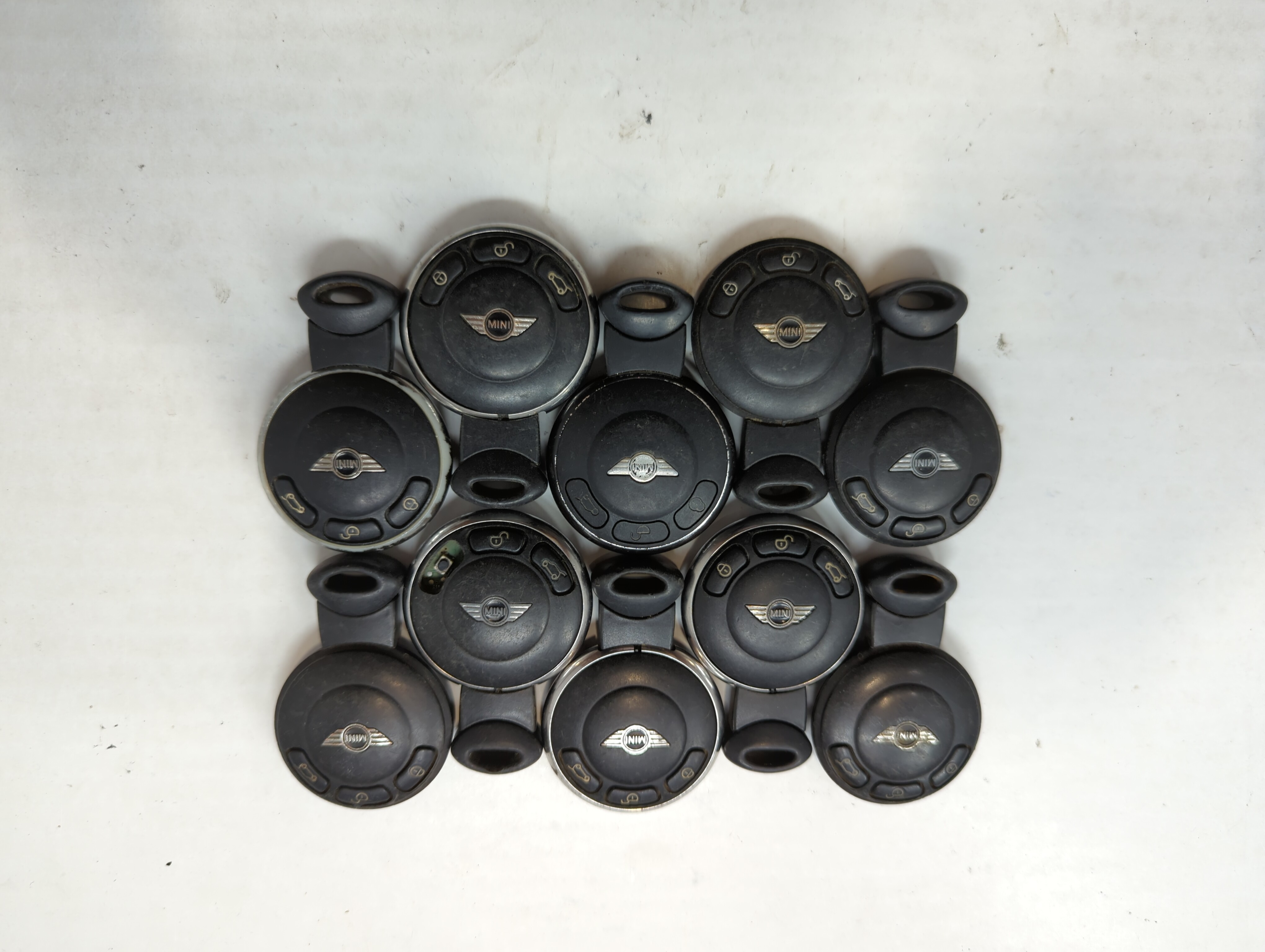 Picture of Lot of 10 Mini Keyless Entry Remote Fob IYZKEYR5602 MIXED PART NUMBERS 641478