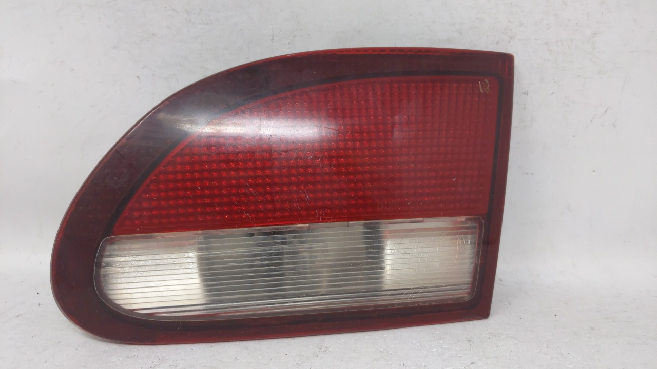 Picture of 1995-1999 Chevrolet Cavalier Passenger Right Side Tail Light Taillight Oem 69330