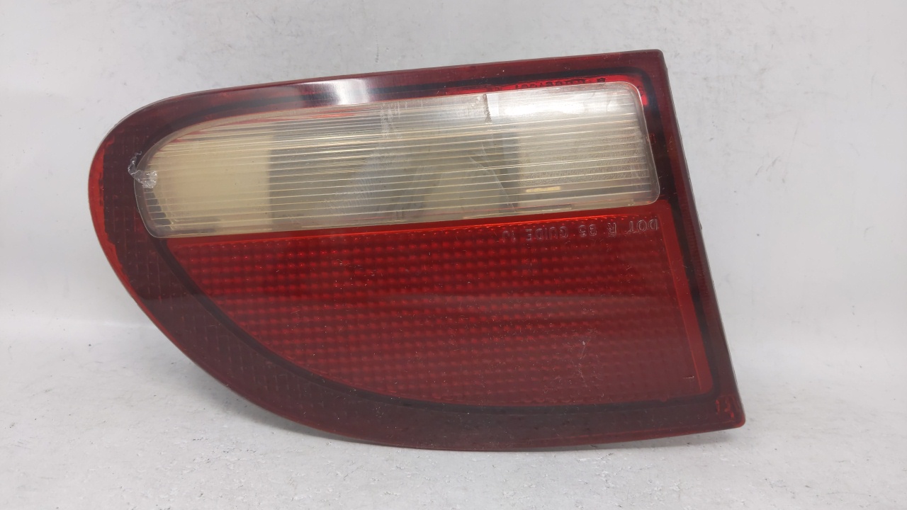 Picture of 1995-1999 Chevrolet Cavalier Passenger Right Side Tail Light Taillight Oem 69332
