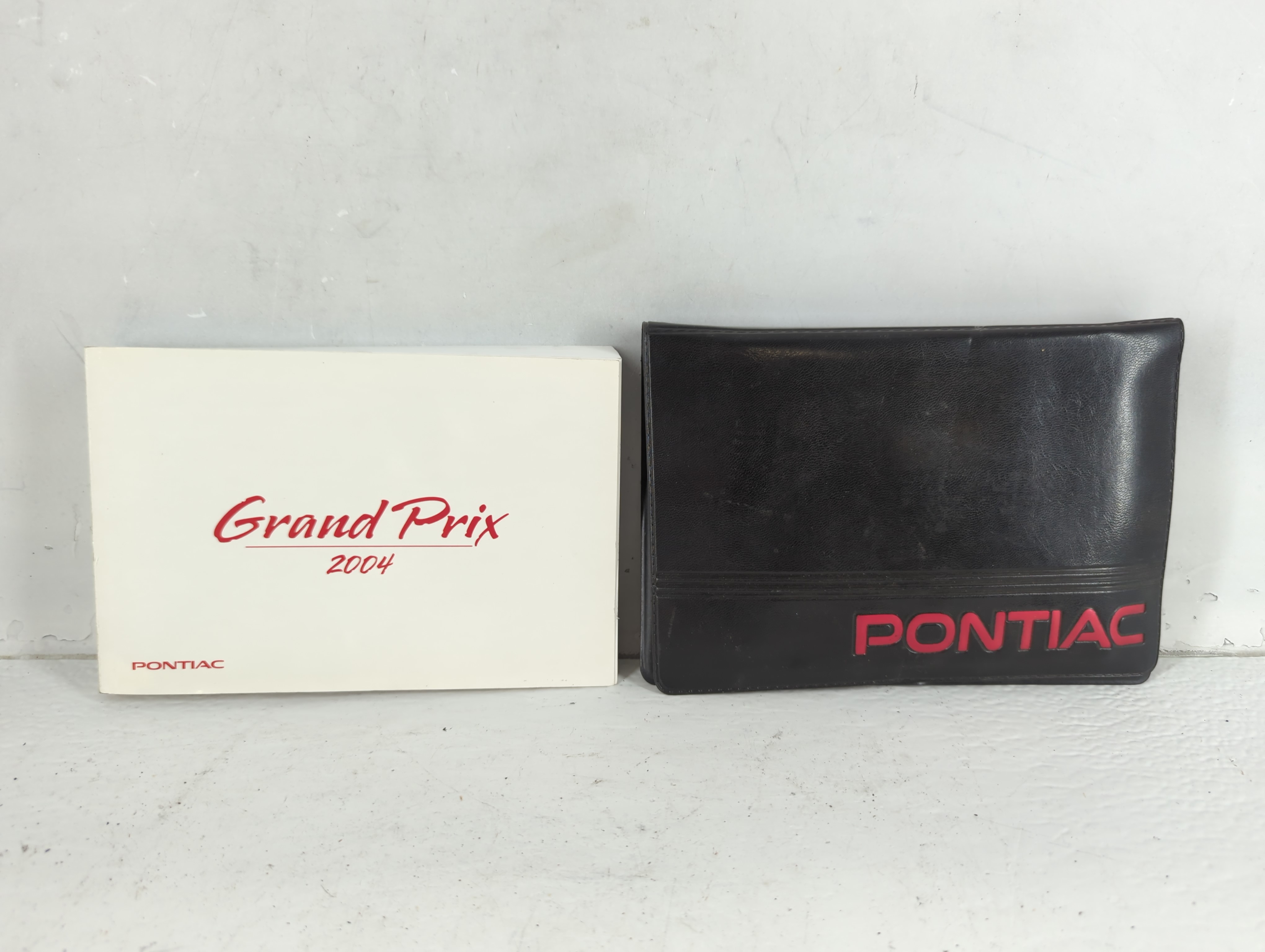 2004 Pontiac Grand Prix Owners Manual Book Guide 703111 - Oemusedautoparts1.com